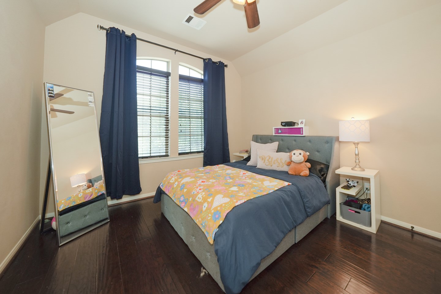 cozy bedroom with large windows