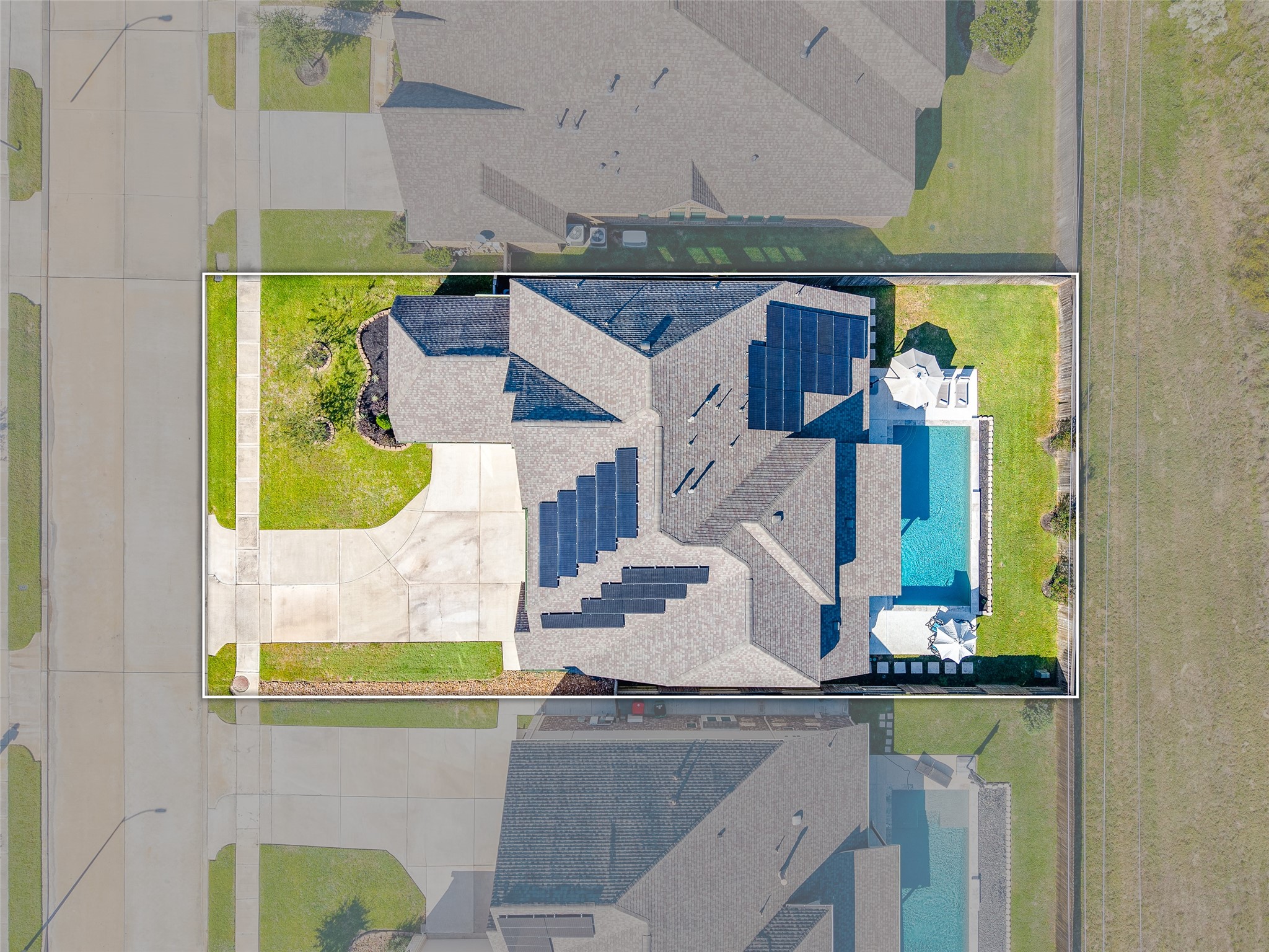 Drone view of this 70' front lot located in a low-traffic part of the subdivision. No neighbors or buildings behind the lot.