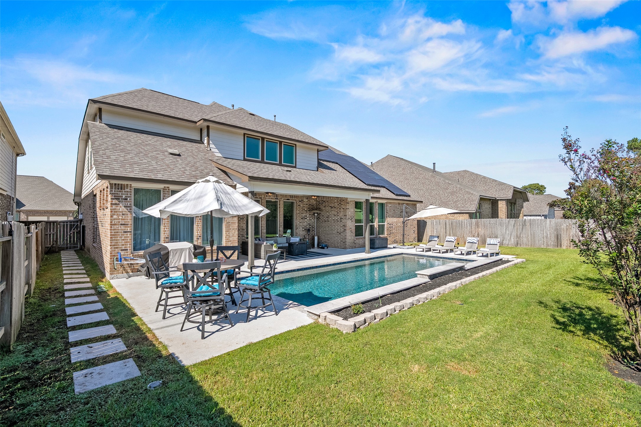 Imagine shady afternoons by the pool grilling your favorites, and entertaining in your own backyard retreat.  Pool specs: 14 'x 32' Gunite pool 3.5' deep x 5.5' deep and there are no neighbors or buildings behind the lot.