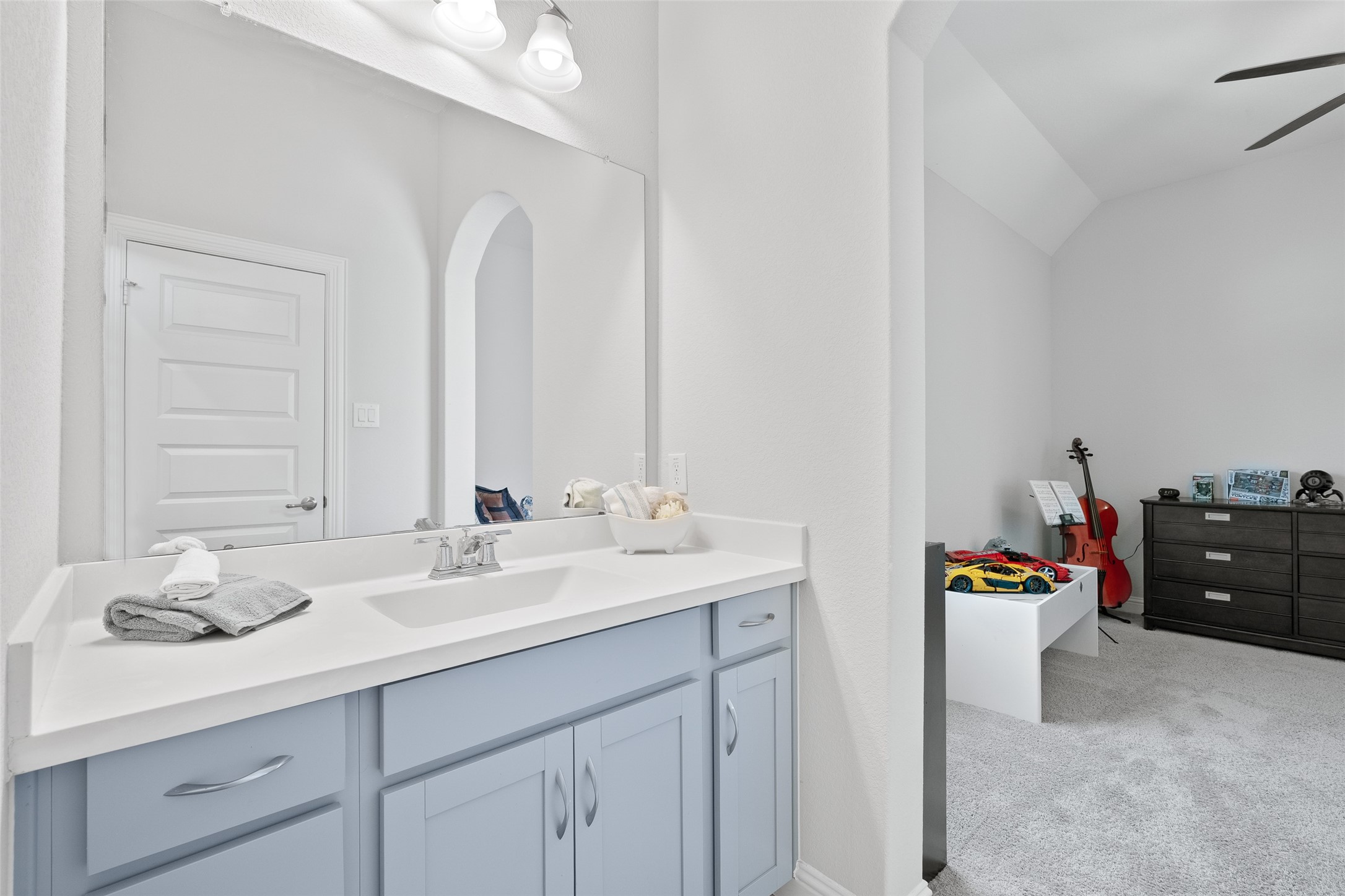 Private separate sink, lots of storage, and a walk-in closet.  Jack and Jill style shared combo tub shower.