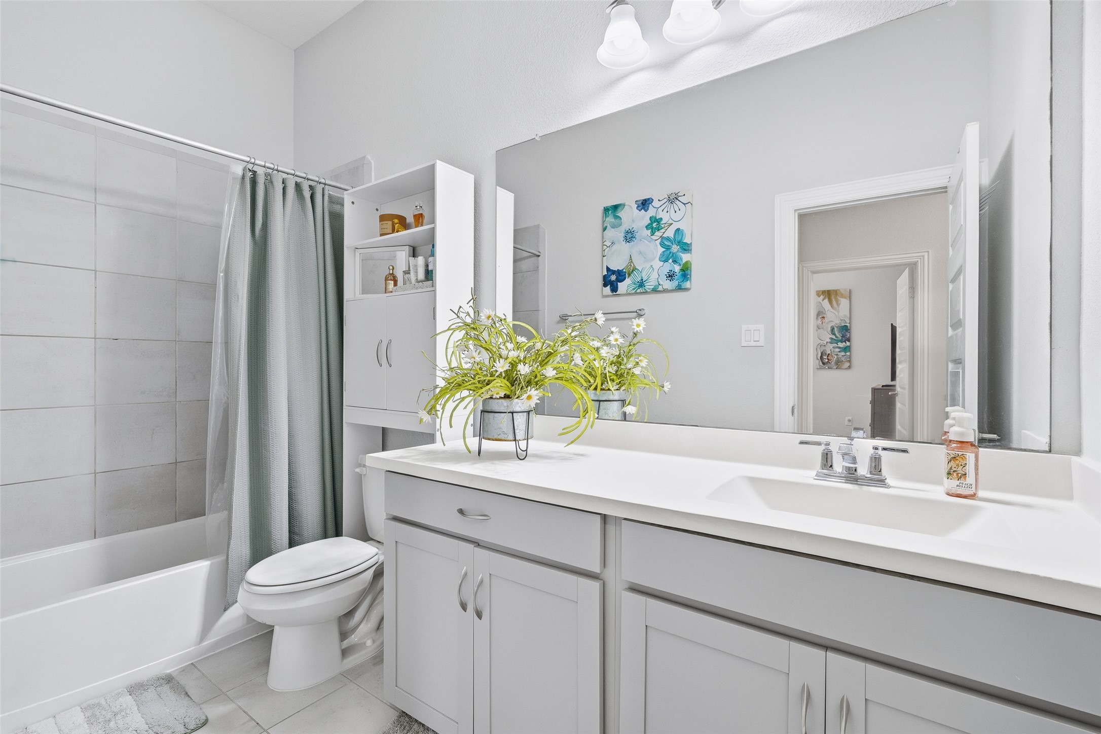 The second-floor full bath with a combo tub shower.