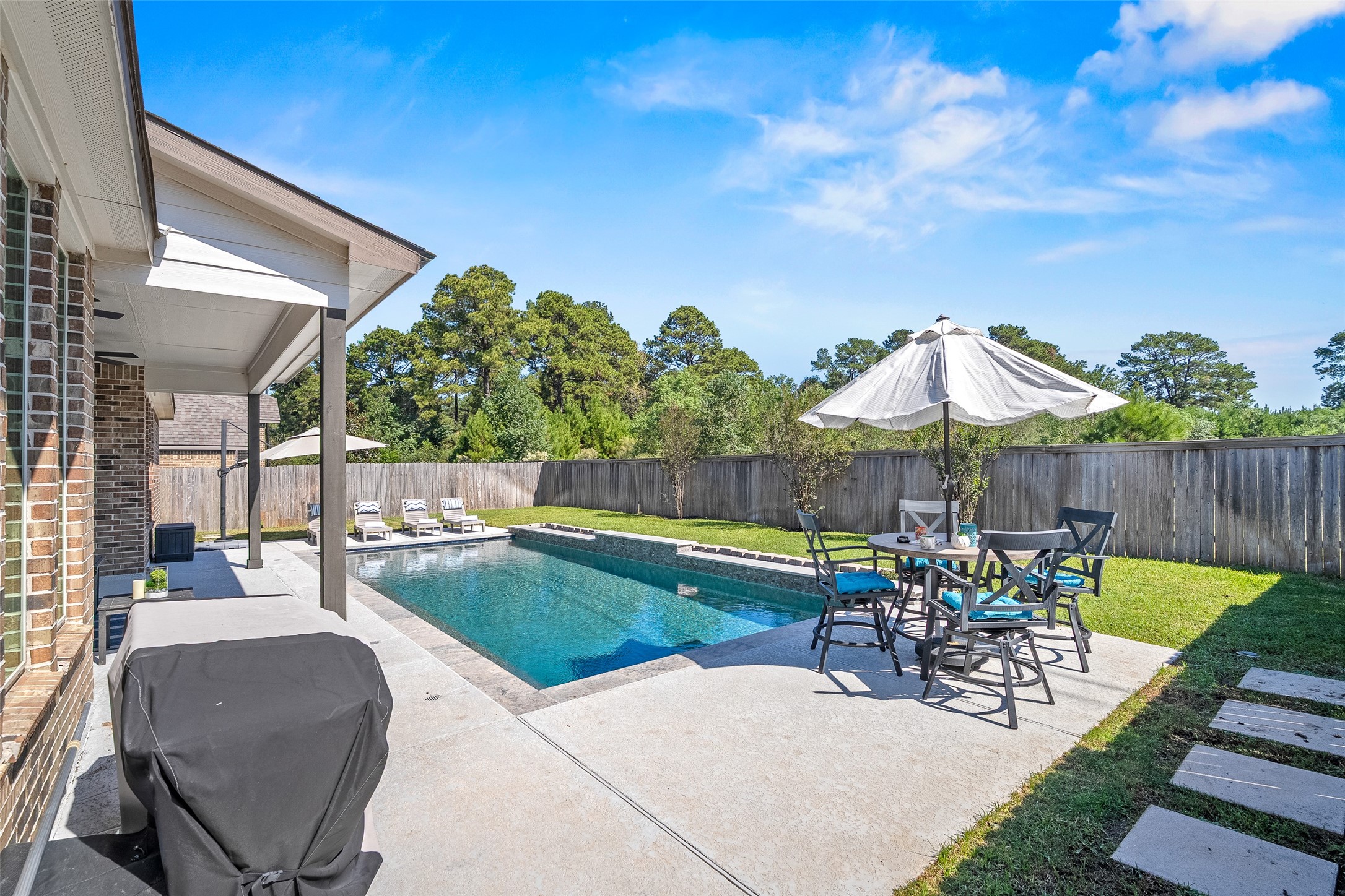 Plenty of space on the deck or covered patio for your charcoal or propane grill. The sunrise from this angle is beautiful!