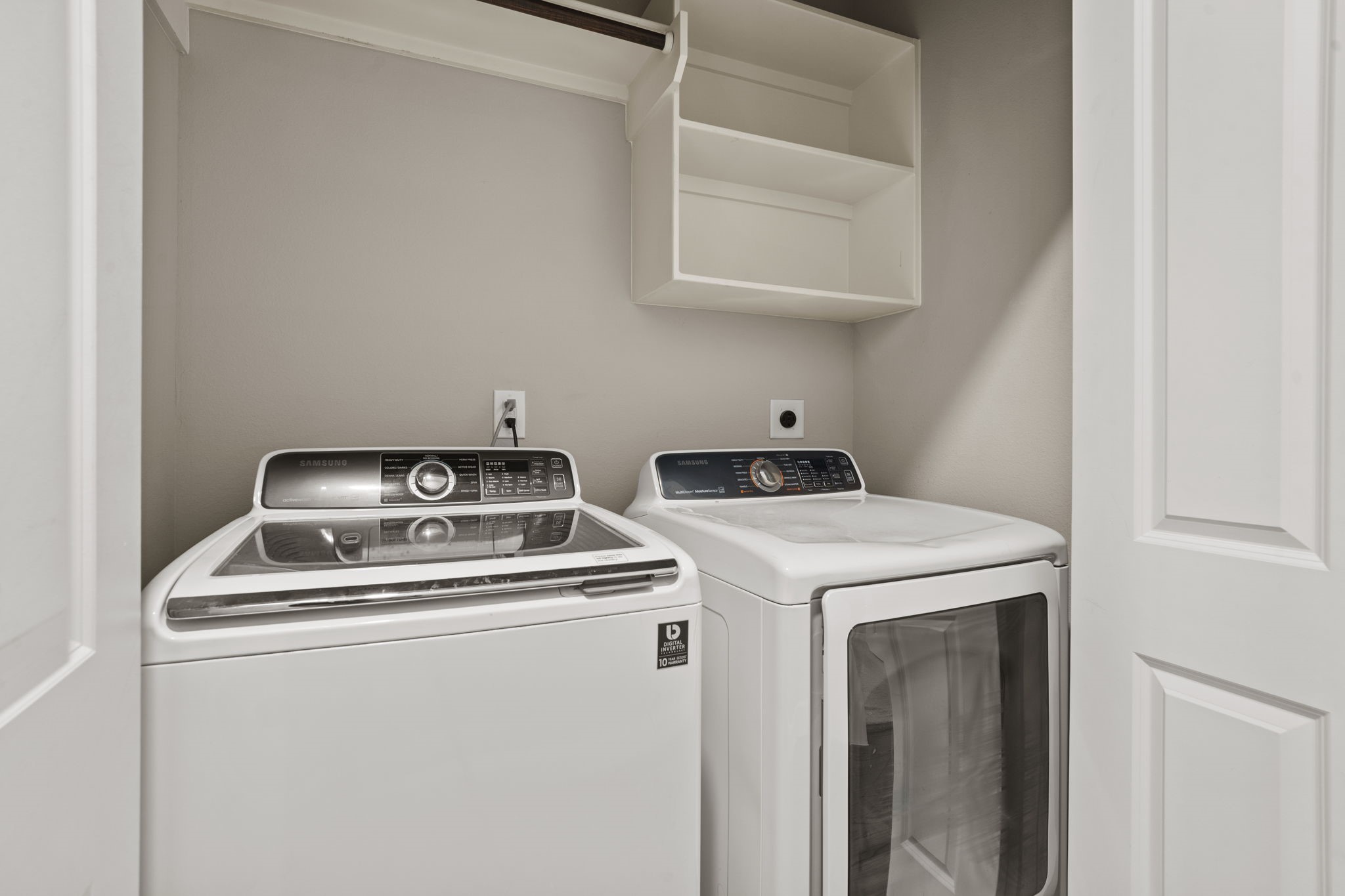 The laundry room is centrally placed between the primary and secondary bedroom.