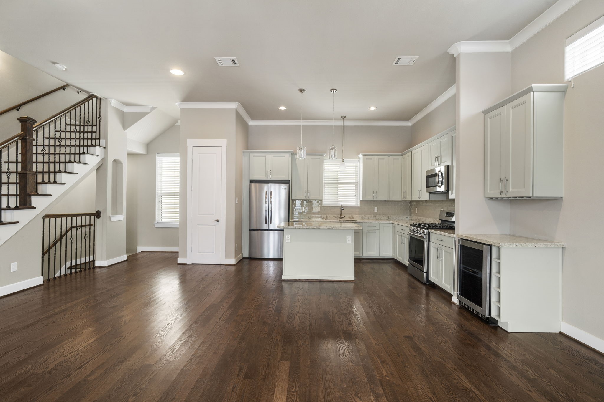 The kitchen offers an efficient layout with easy access to appliances, workspace, and storage.