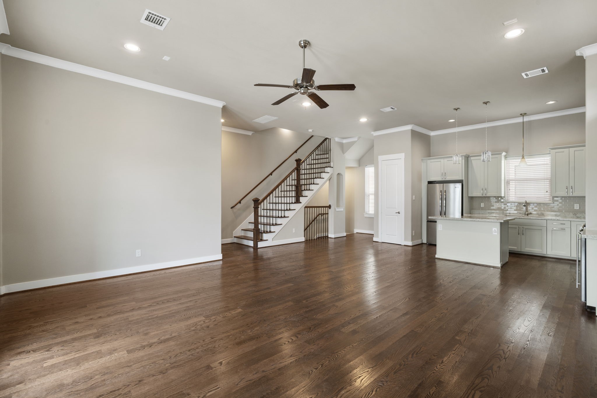 The great room offers endless design possibilities, allowing you to create a formal dining area or a more casual dining space.