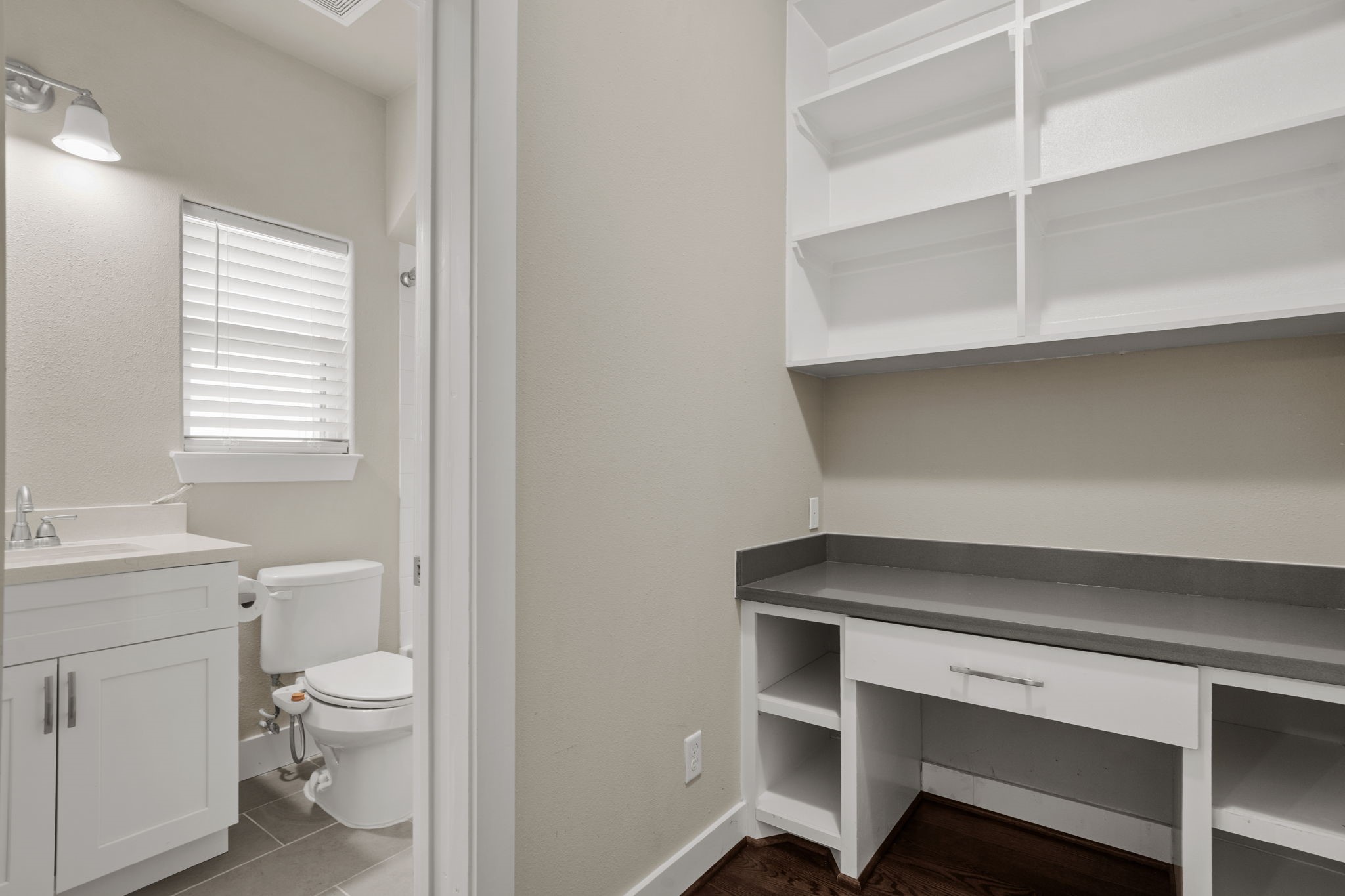 A unique and thoughtful feature of this home, the 8' x 5' mini office is tucked between the bedroom and en suite bathroom and includes a built-in desk and shelvingcreating a dedicated space for working, studying, or staying organized.
