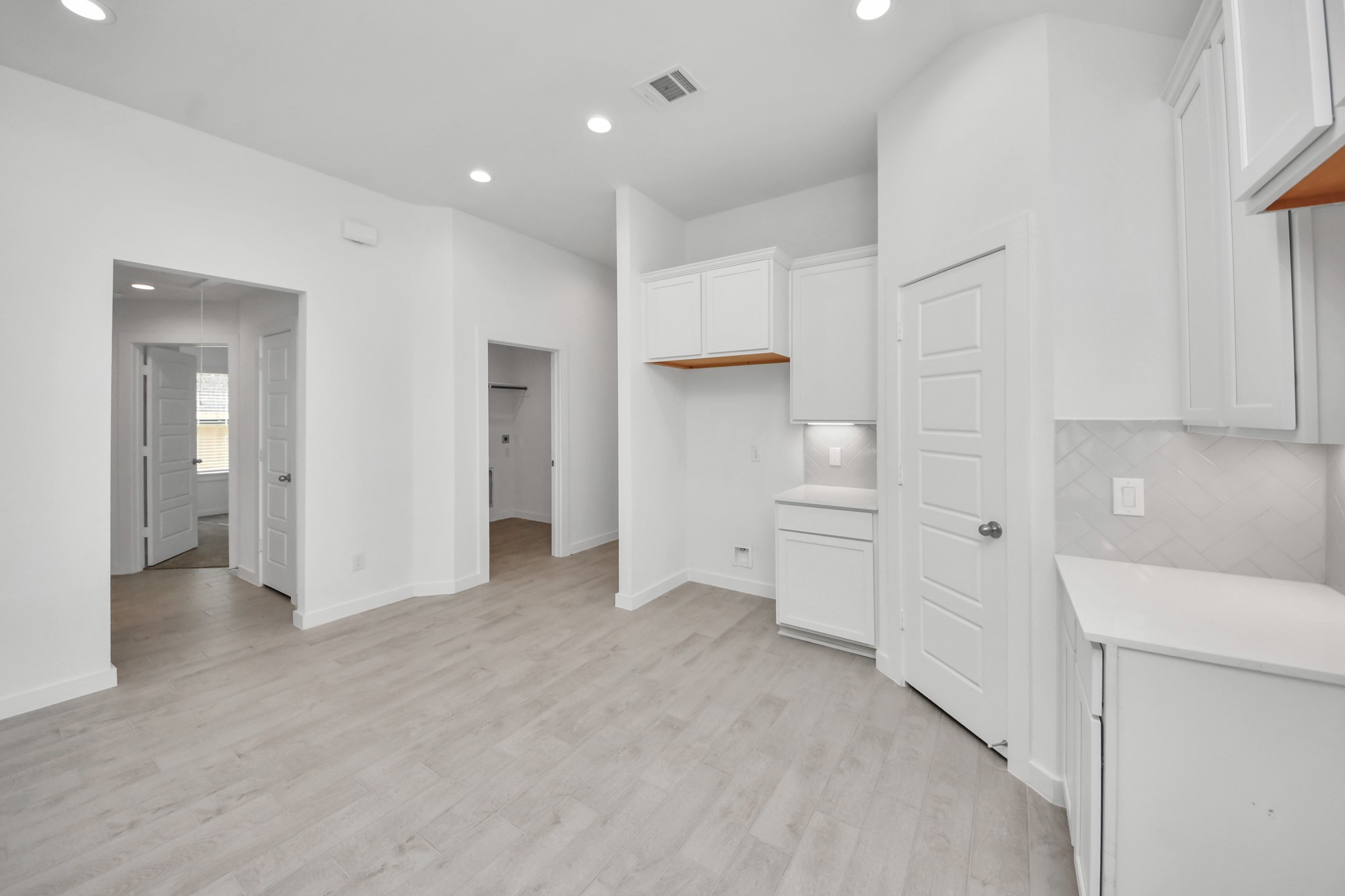 All of this overlooks your expansive family room, creating a perfect space for culinary delights and family gatherings.