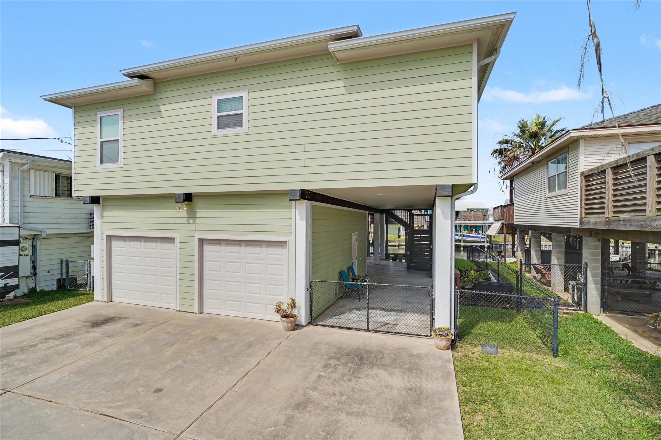 Amazing home featuring oversized double garages, an open bay perfect for entertaining, and a fully fenced yard ideal for pets