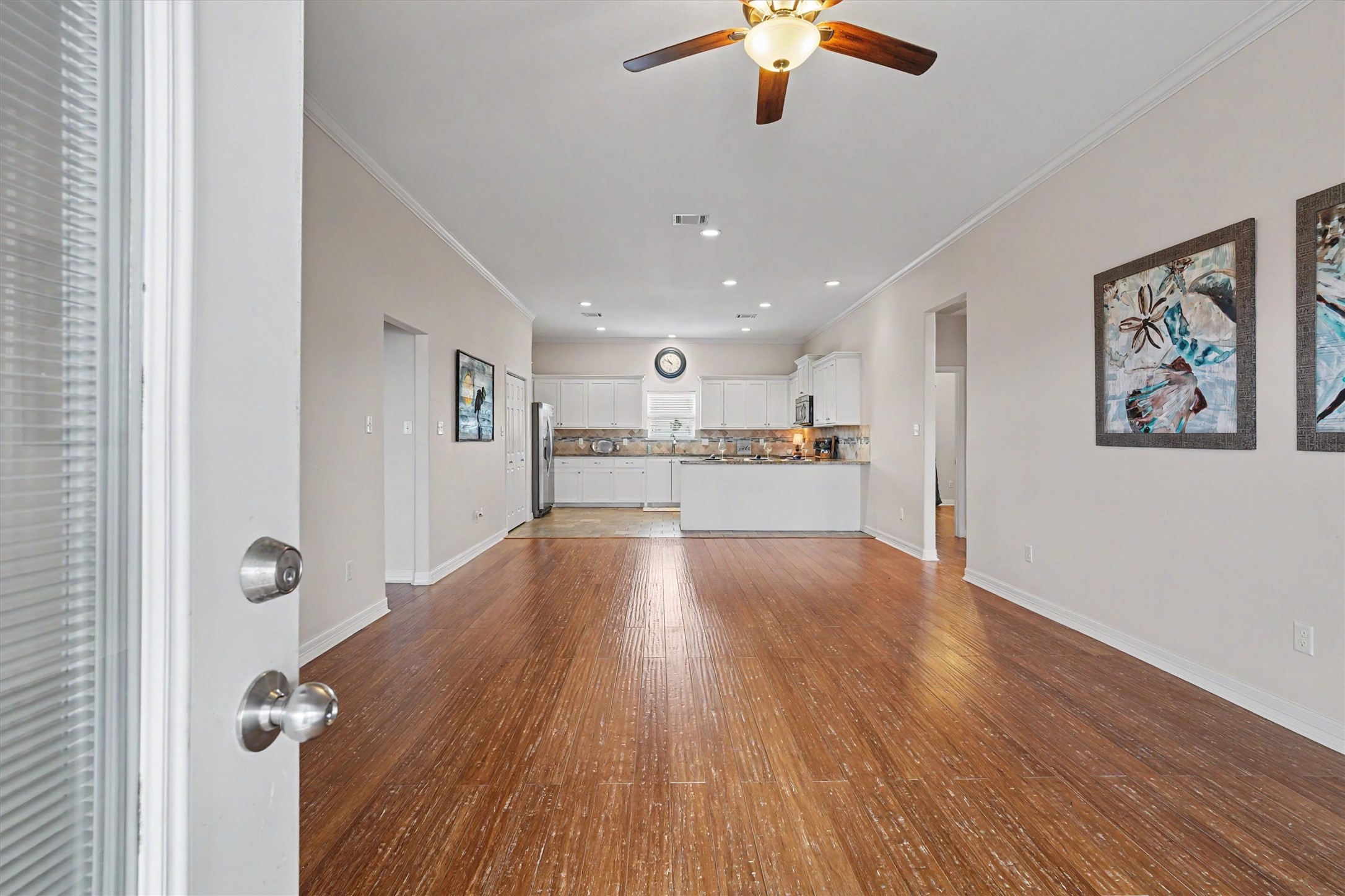 As you walk through the french doors you immediately notice the coastal inspired bamboo flooring with "hand scraped" detailing As you walk through the french doors you immediately notice the coastal inspired bamboo flooring with "hand scraped" detailing