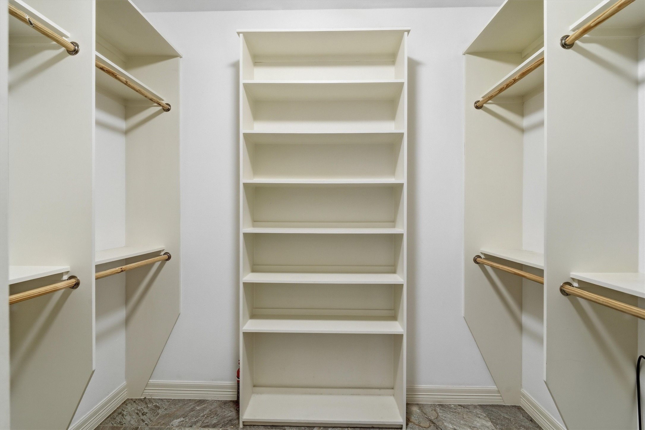 This huge walk in closet with built in storage will not disappoint the new owner of this home