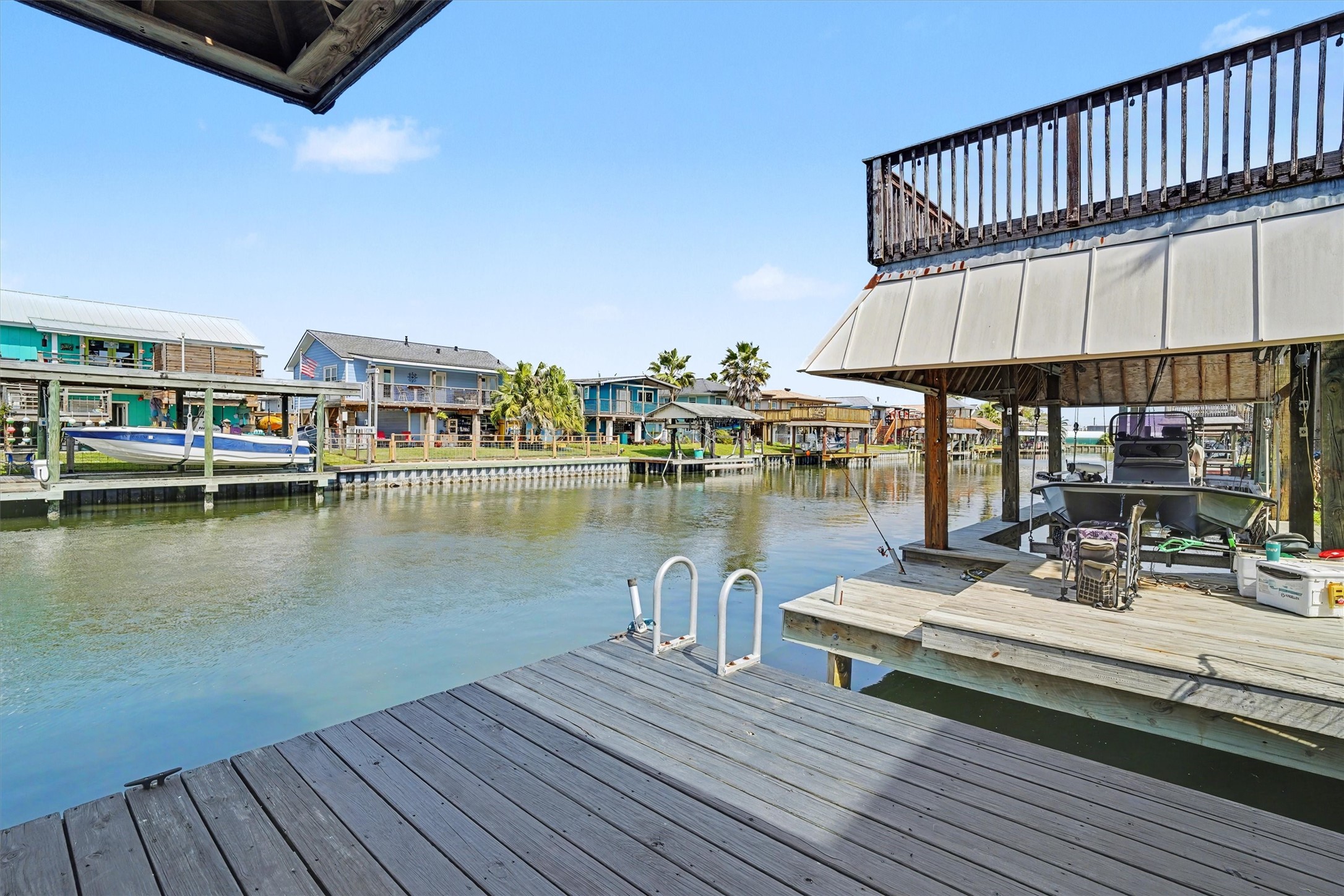 Expansive dock with easy-access steps for slipping in and out of the wateryour personal gateway to relaxation and fun. Take in the tranquil views and feel the calm of the peaceful waters right from your very own dock