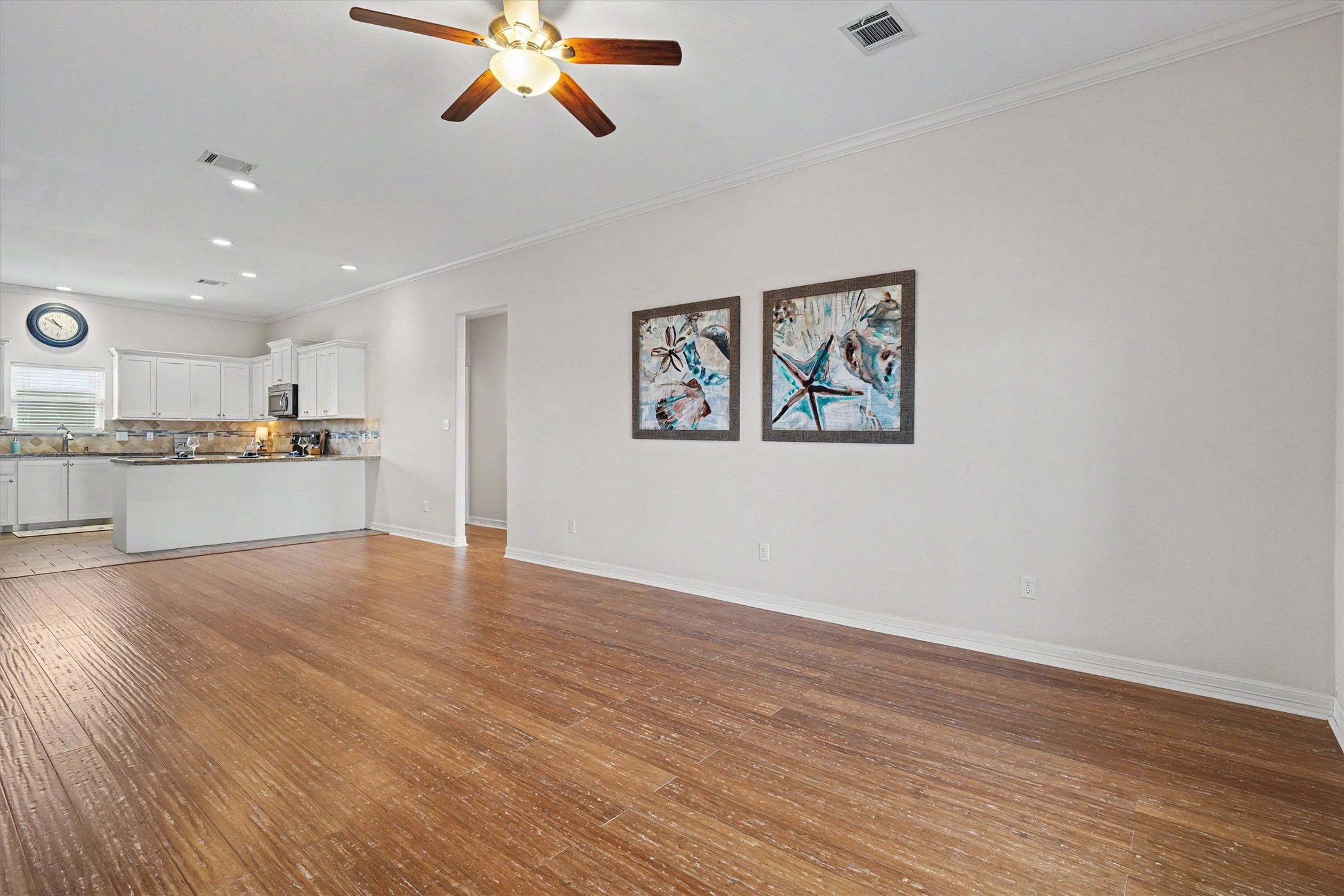The living area is very large to accommodate multiple seating areas and furnishings. The living area overlooks the waterfront