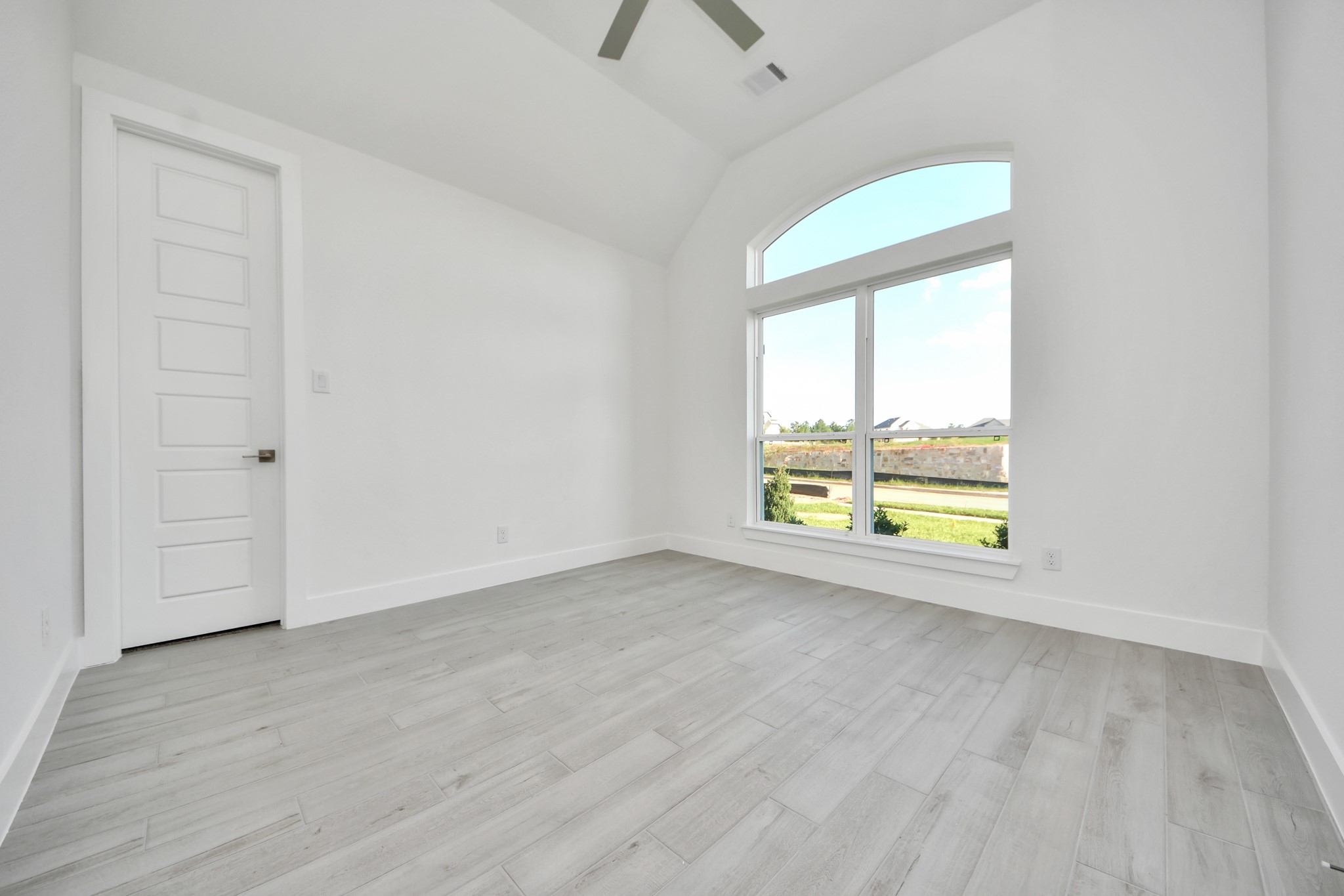 Step into the inviting home office, where elegant tile flooring adds a touch of freshness and comfort to the workspace. Natural light pours through the window, creating an inspiring environment for productivity and focus.
