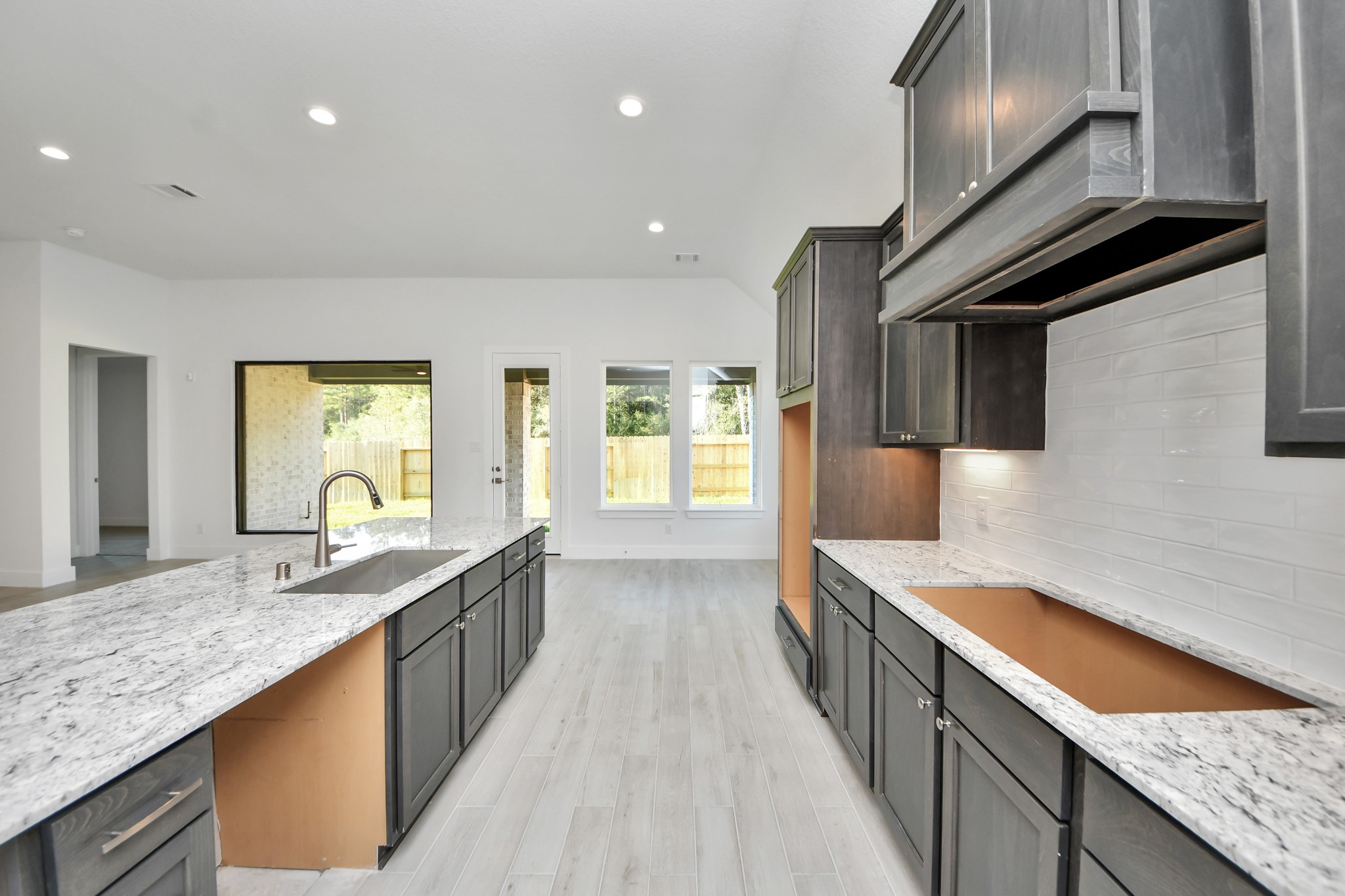 The extended counter area adds both practicality and style, making meal preparation a breeze. Every detail is thoughtfully designed to enhance the kitchen's functionality and aesthetic appeal.