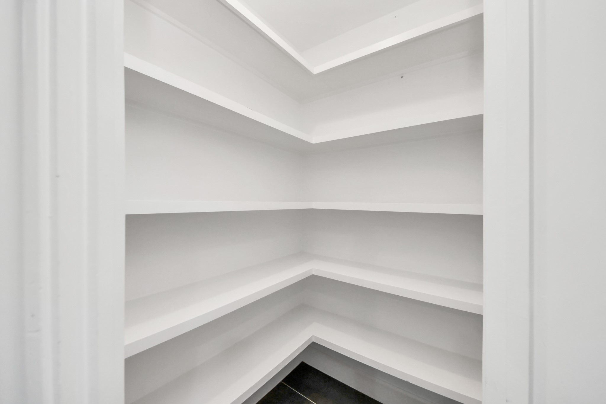 Large linen closet in secondary bathroom.