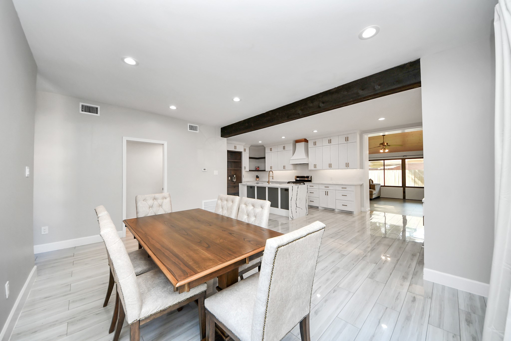 Easy flow and great visibility with the kitchen-dining combo.