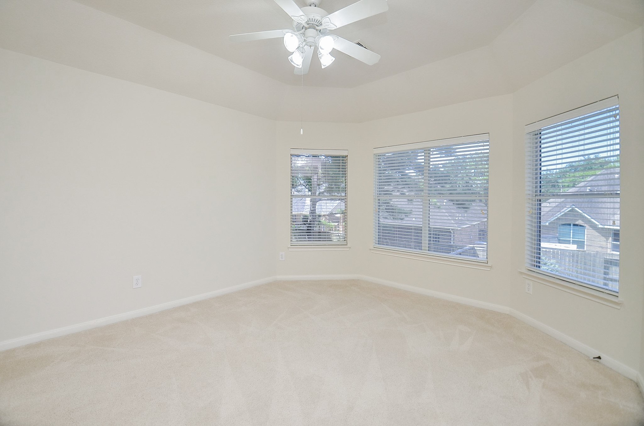 Cozy second bedroom one with clean lines and a tranquil vibe.