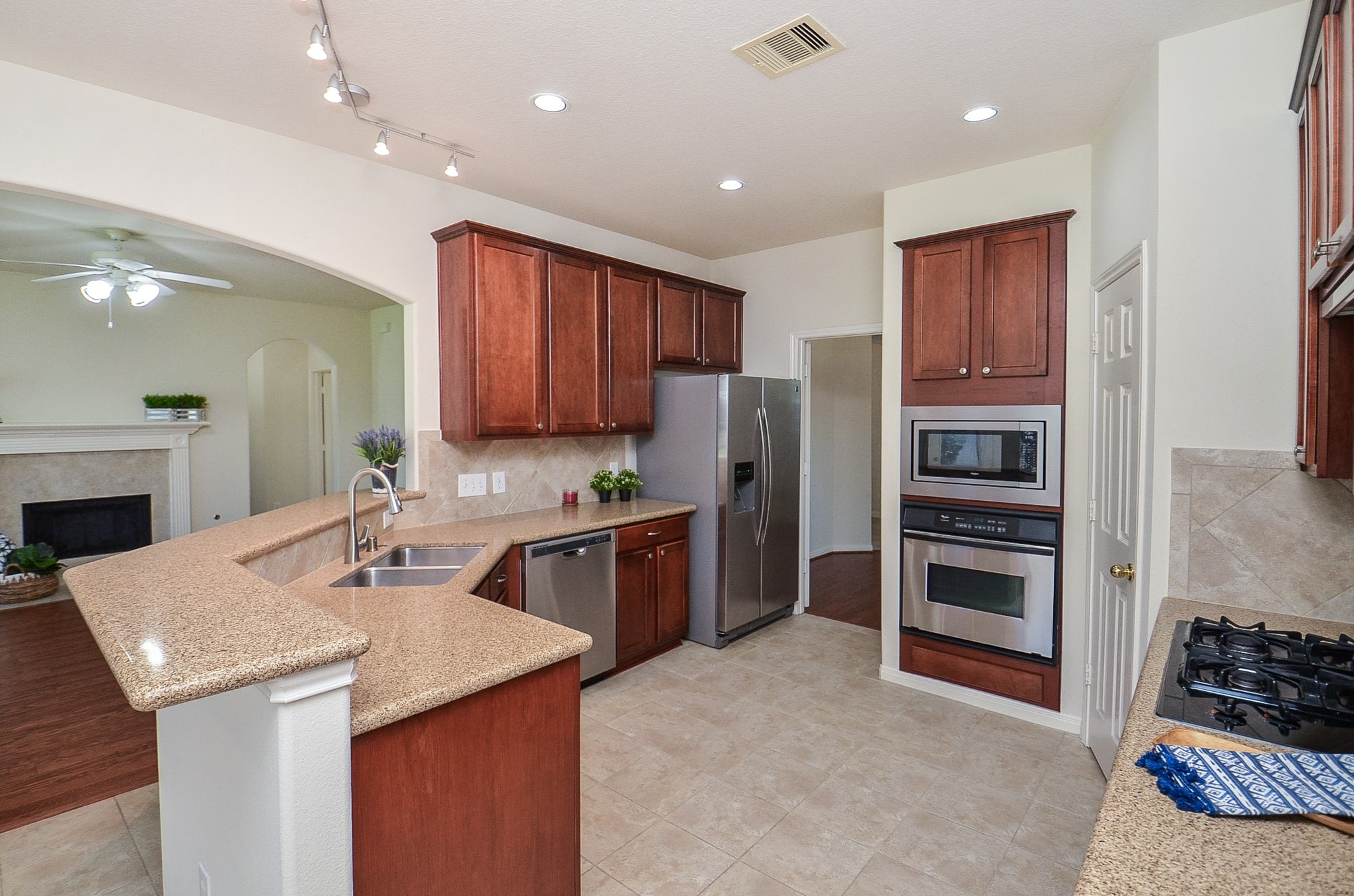 The kitchen features abundant natural light from large windows, and perfect for culinary creativity.
