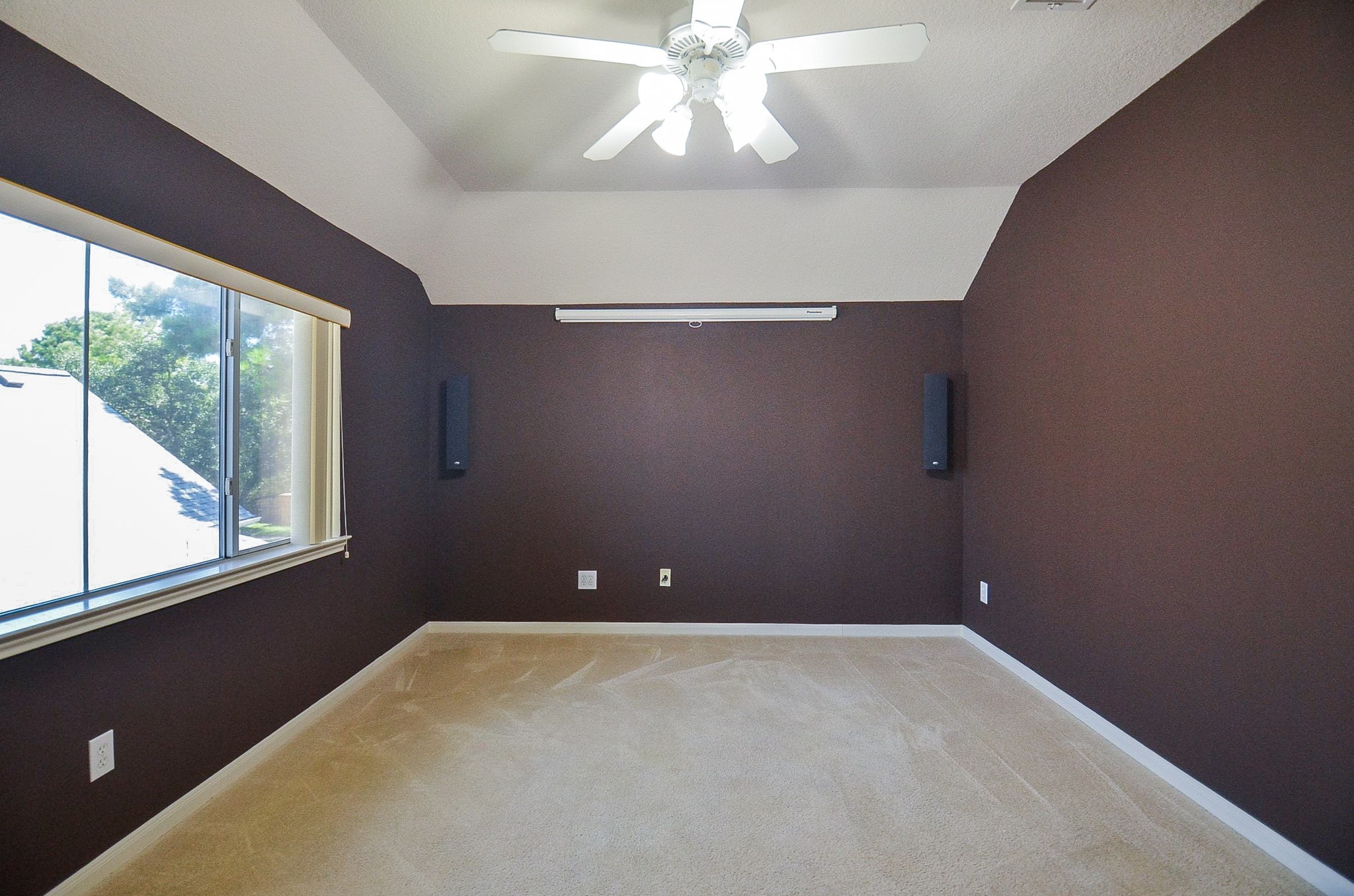 Transform this versatile space into the ultimate media or game room, perfect for relaxation and entertainment.