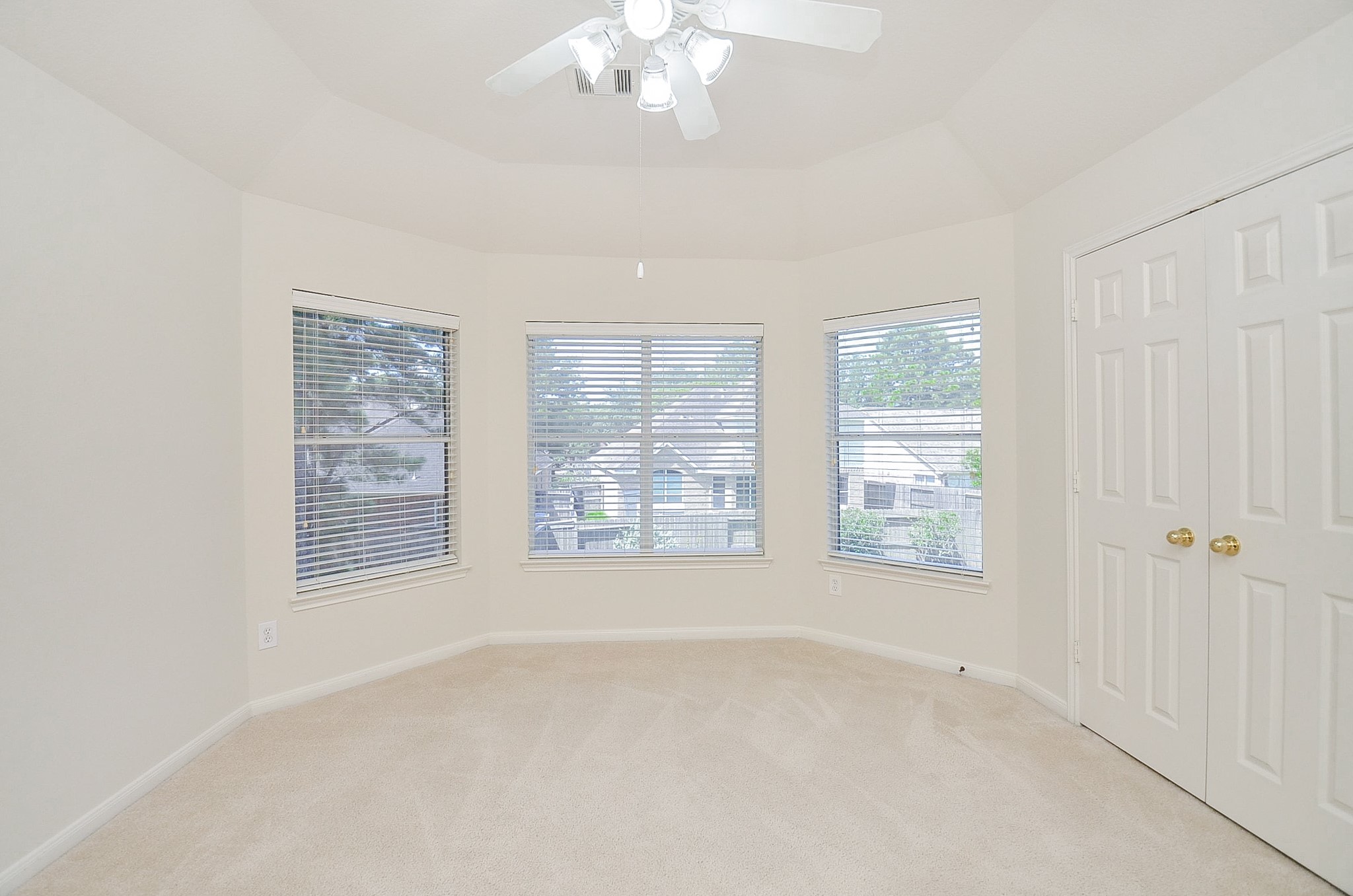Cozy second bedroom one with clean lines and a tranquil vibe.