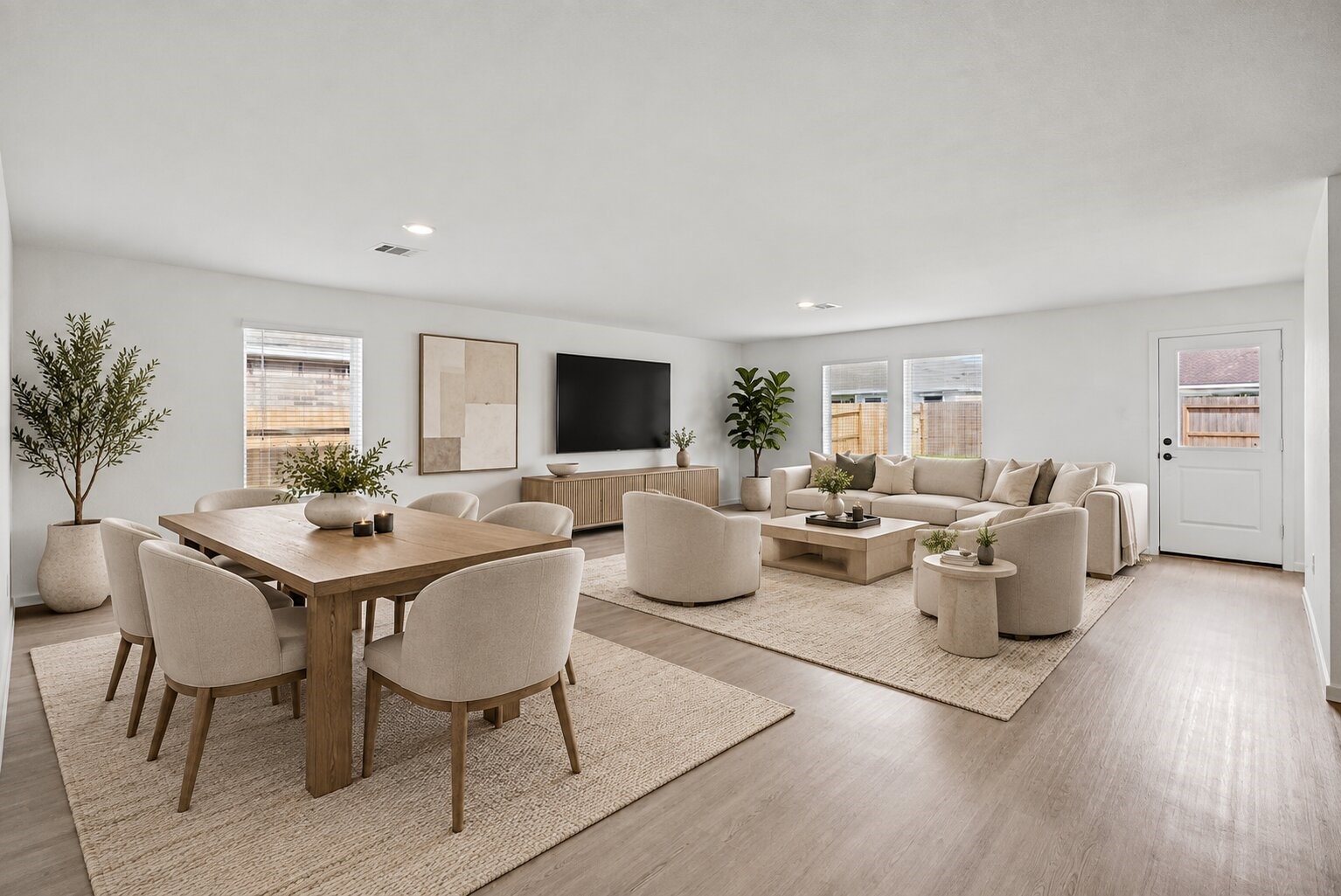 **Virtually Staged**Imagine making this open living and dining space your own. Roomy, light-filled, and designed for everything from relaxed evenings to dinners with friends.