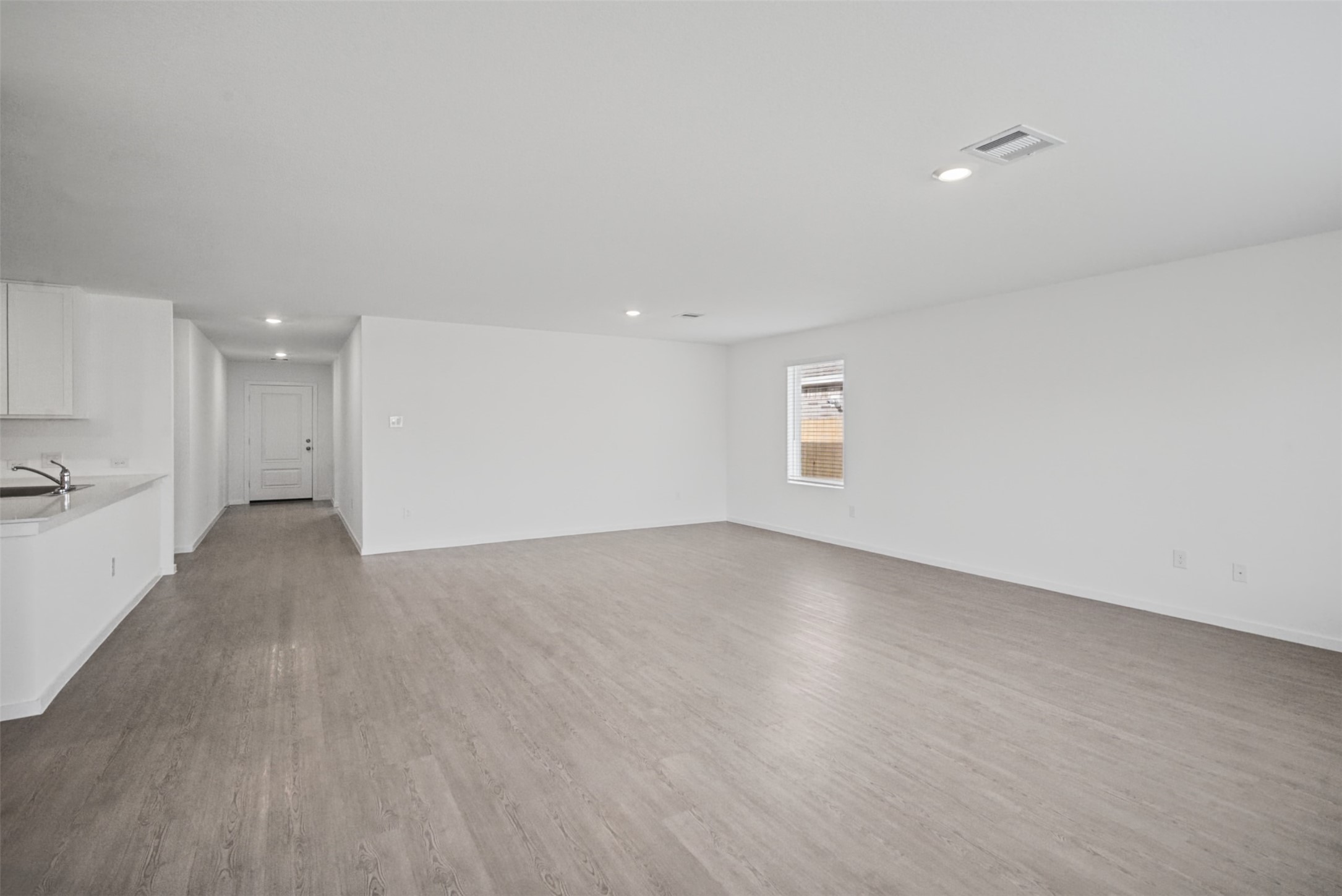 Bring your furniture and your vision. This generous living space offers the flexibility to go cozy and comfortable or create a larger entertainment setup.