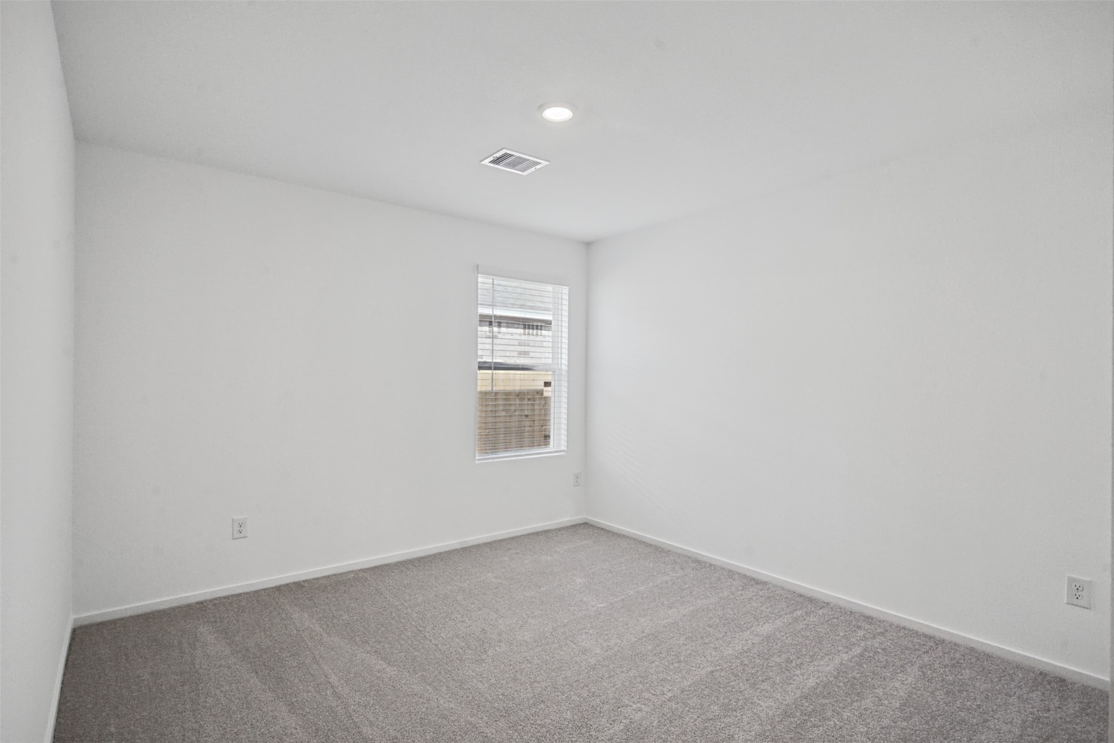 Another flexible bedroom offering a quiet place to unwind, with natural light and plenty of potential to create a space that feels entirely your own.