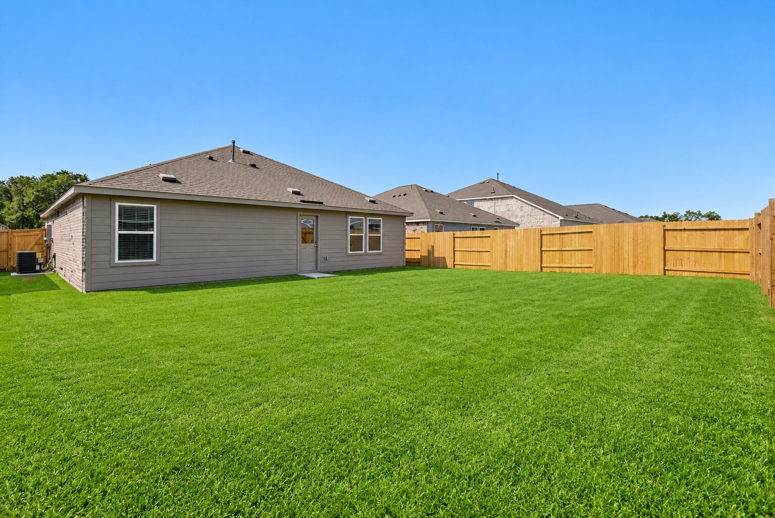 Room to spread out, play, entertain, or create your ideal outdoor retreatthe expansive fenced yard adds another whole dimension to everyday living.