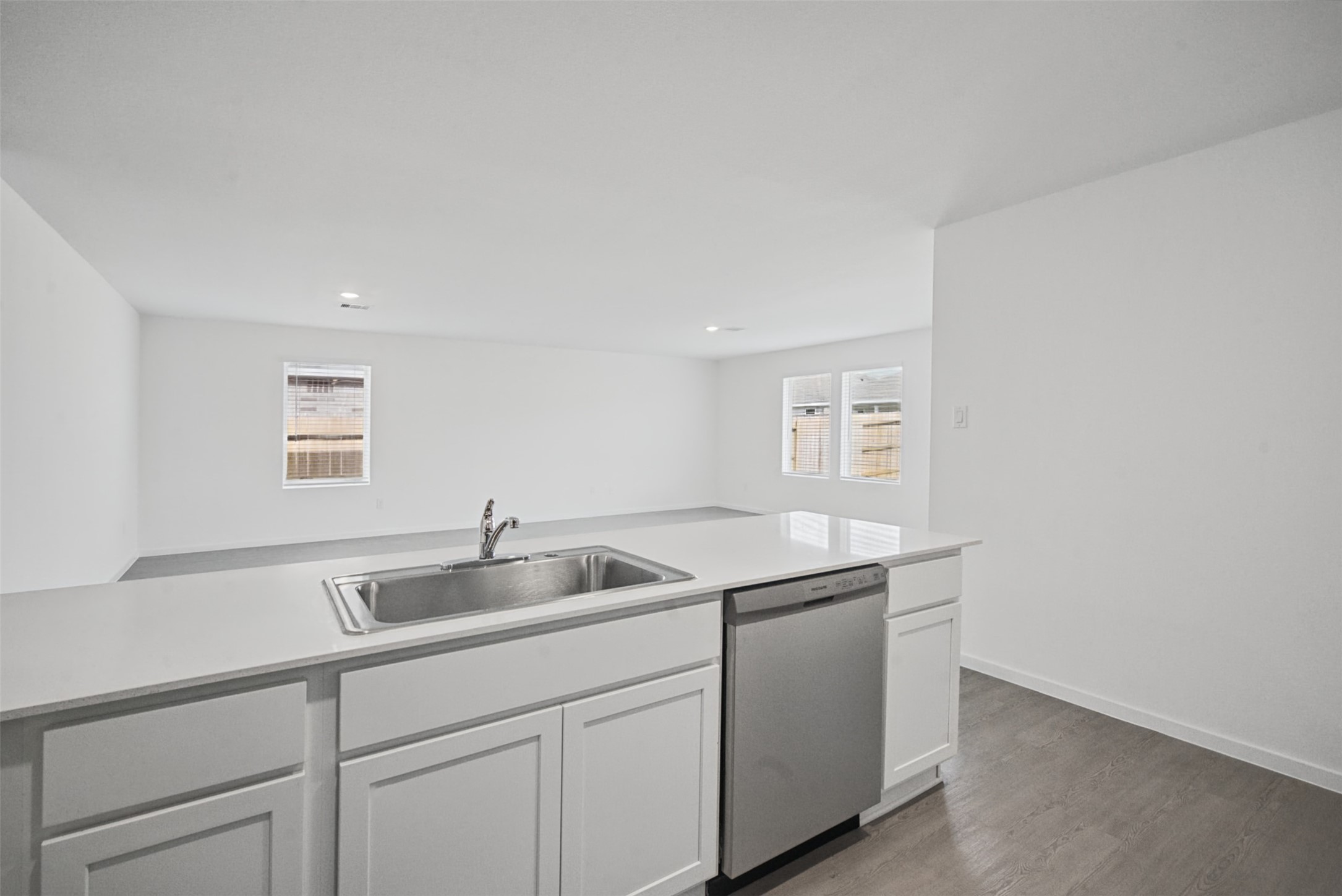 From meal prep to movie night, this open layout makes it easy to move between the kitchen and living area while keeping everyone connected.
