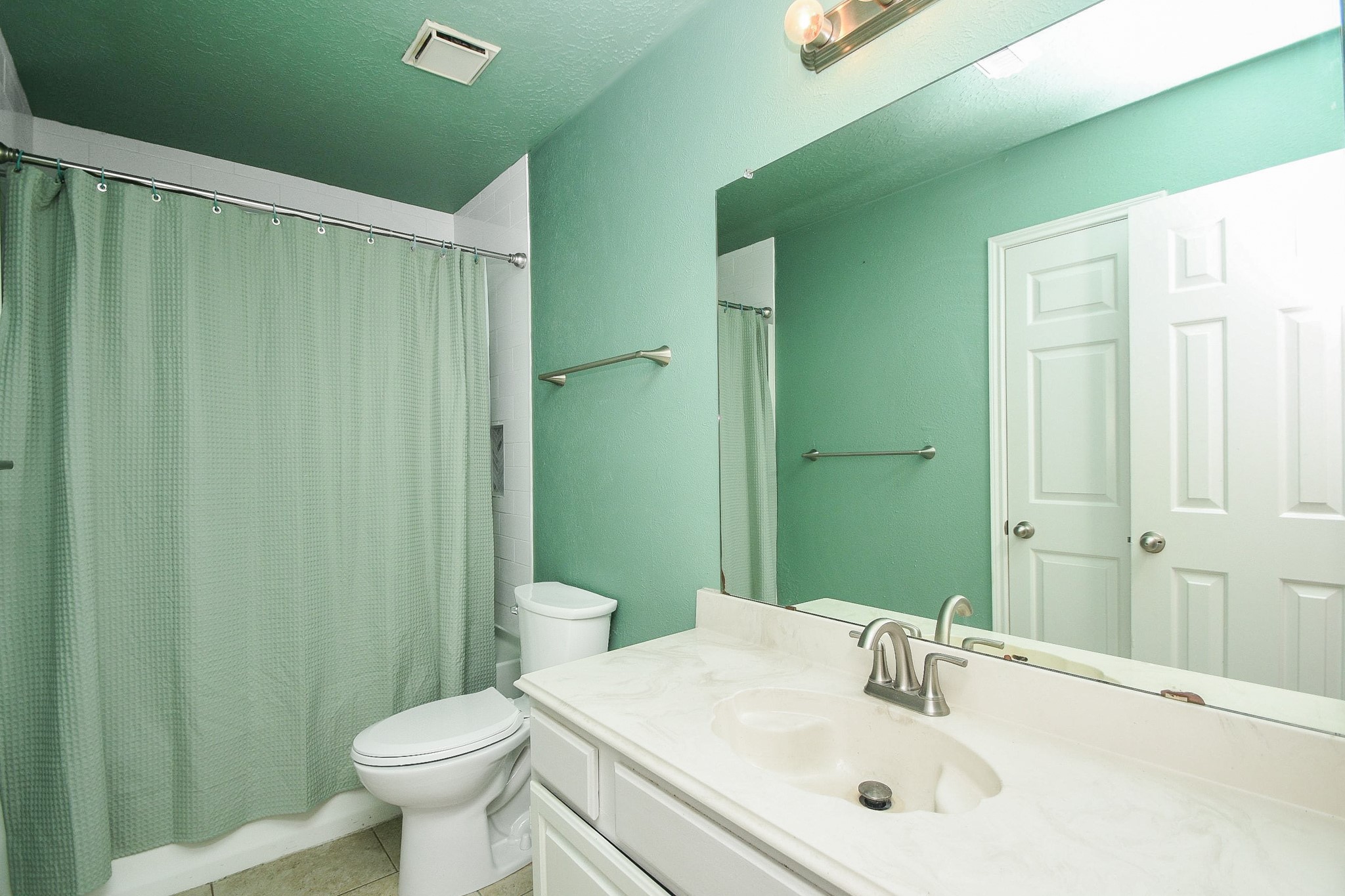 Secondary bath upstairs.