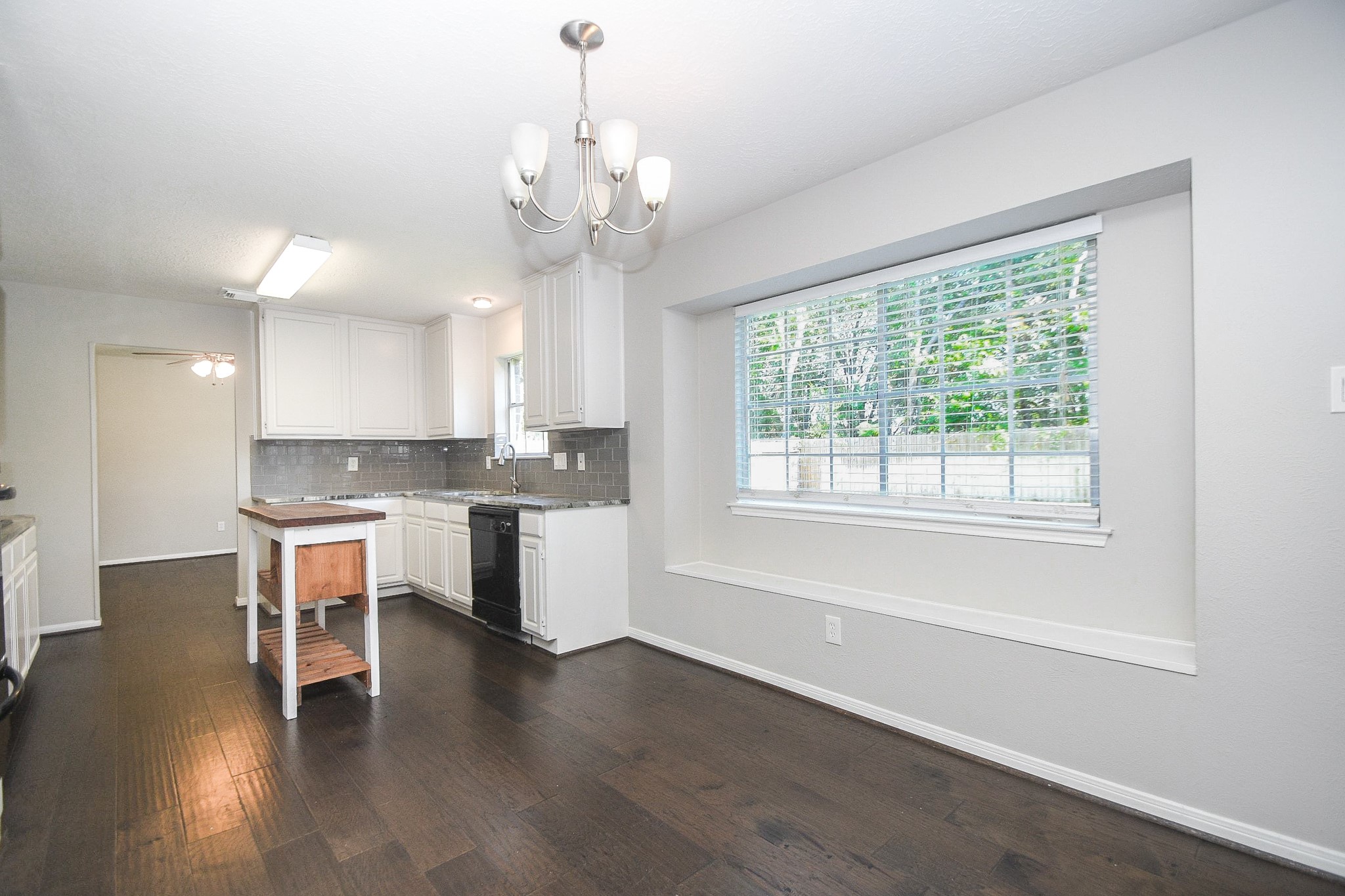 Bright and sunny breakfast nook that overlooks the back yard and no back neighbors.