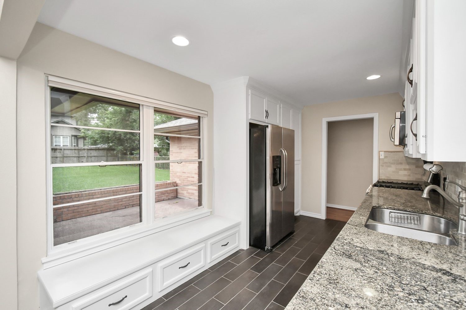 View of back patio and yard.