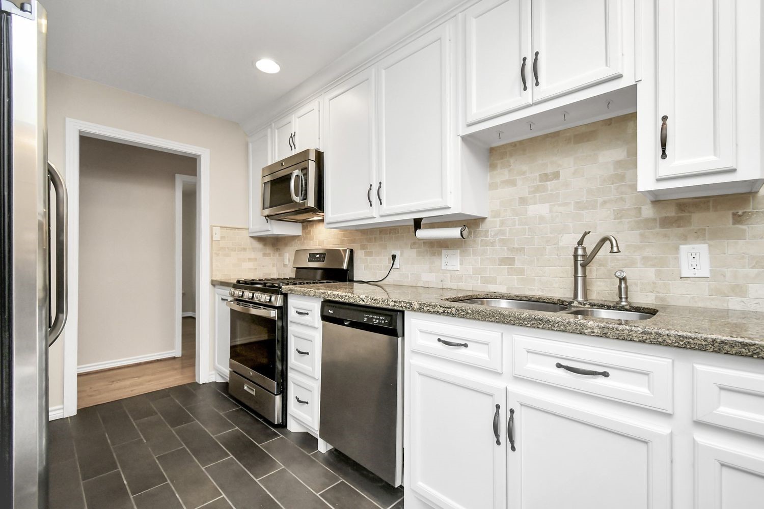Dishwasher, range, microwave and refrigerator included