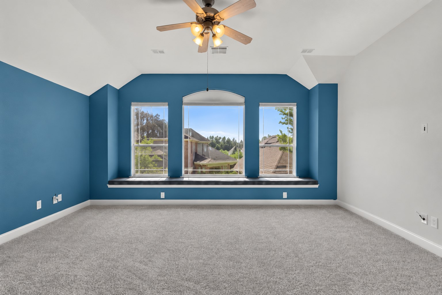 A  spacious upstairs retreat with beautiful windows, abundant natural light and plenty of room to create the ultimate entertainment lounge, recreation space or media area.
