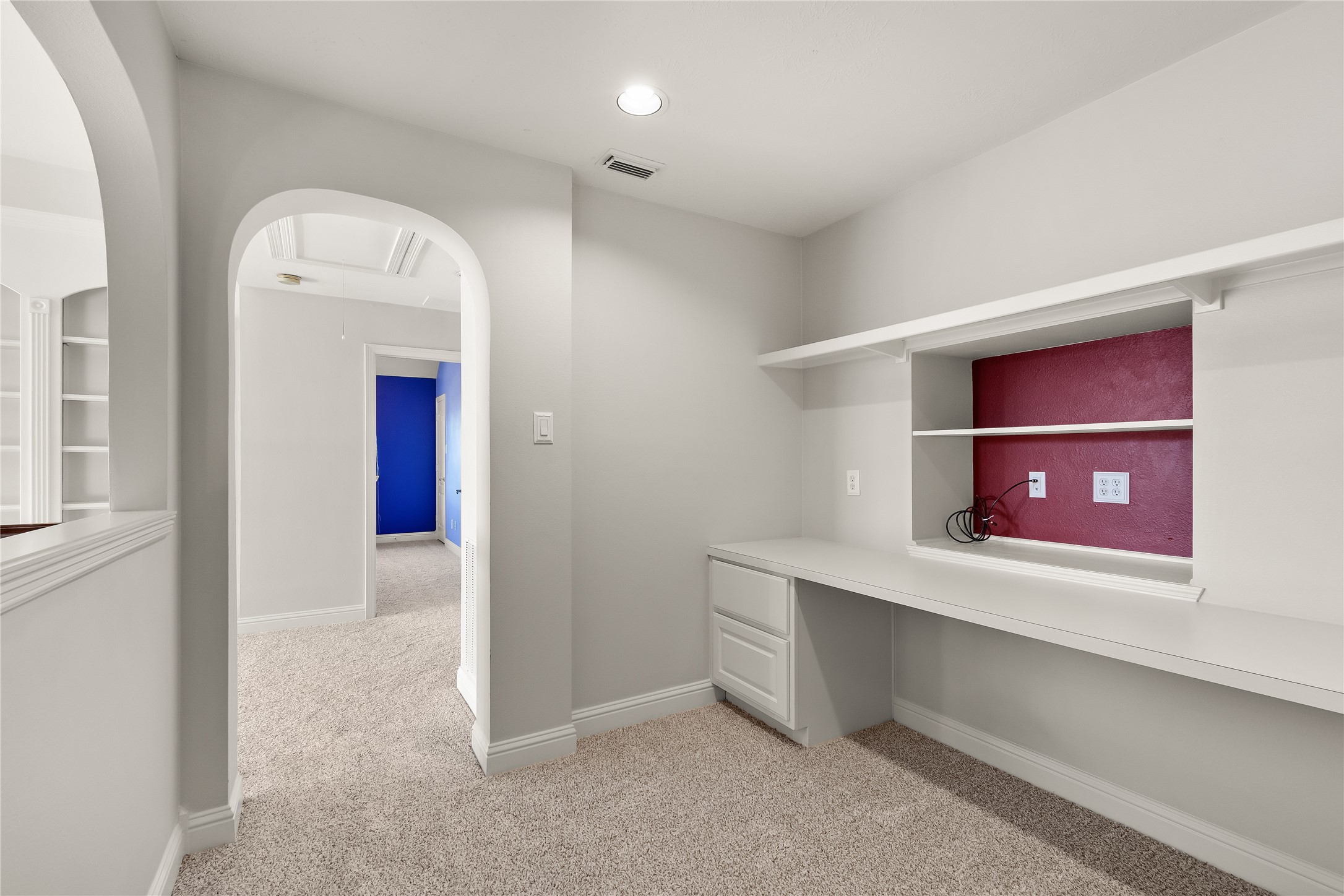 A THOUGHTFUL EXTRA! This upstairs built-in desk and shelving area provides a convenient space for working from home, studying, organizing household essentials or pursuing creative projects.