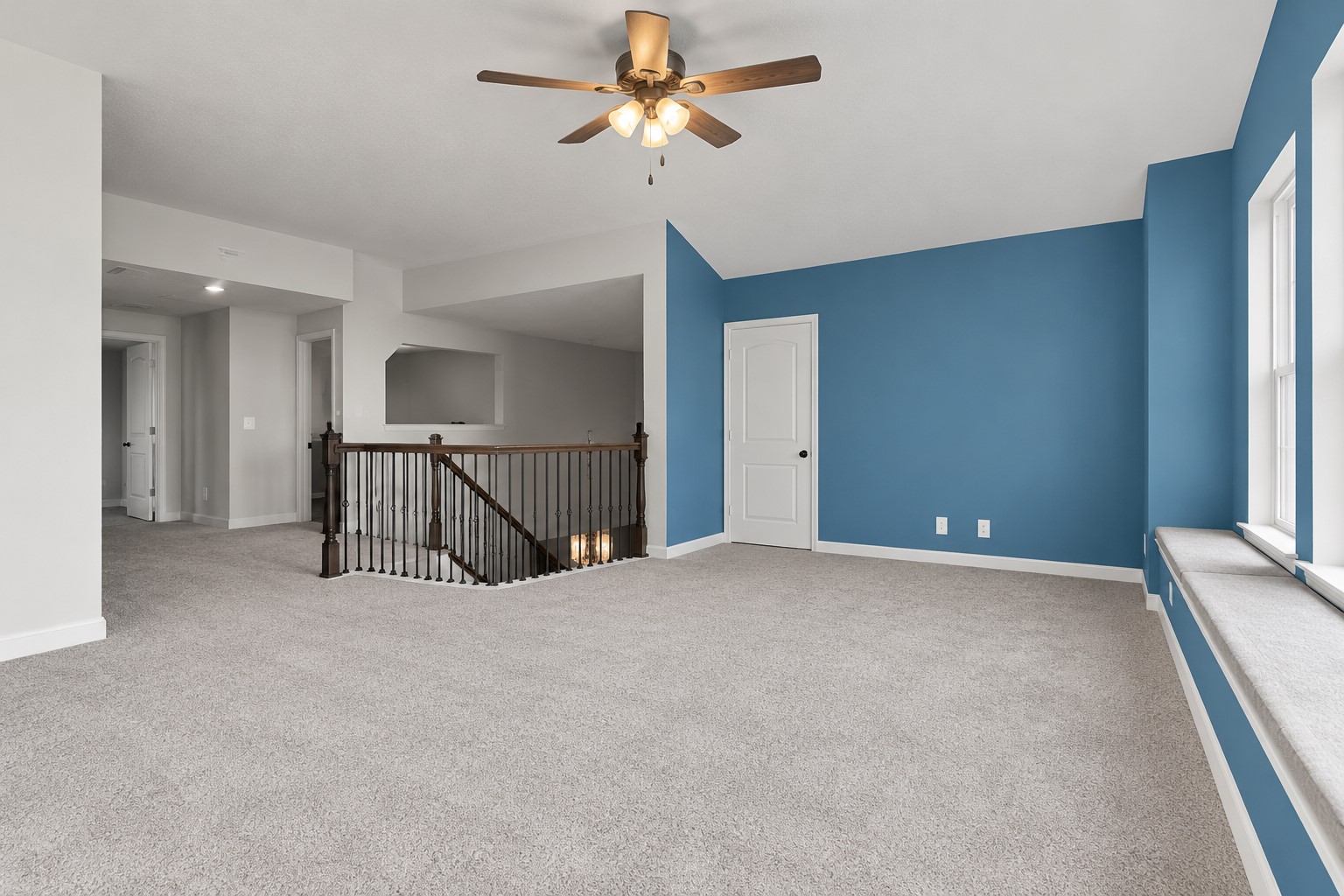 This generously sized upstairs game room offers flexible space for movie nights, games, hobbies or a comfortable second living area.