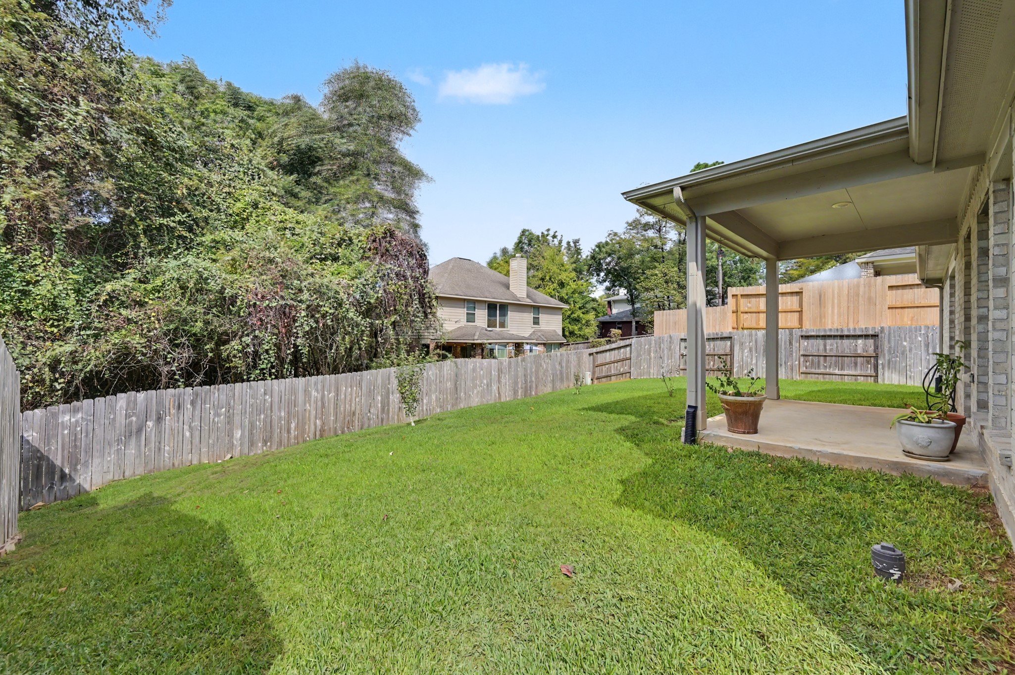 Fully fenced backyard and patio