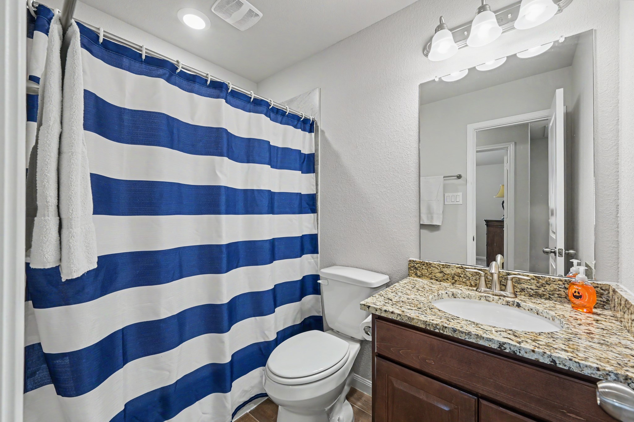 Full bath/shower and tub combo upstairs