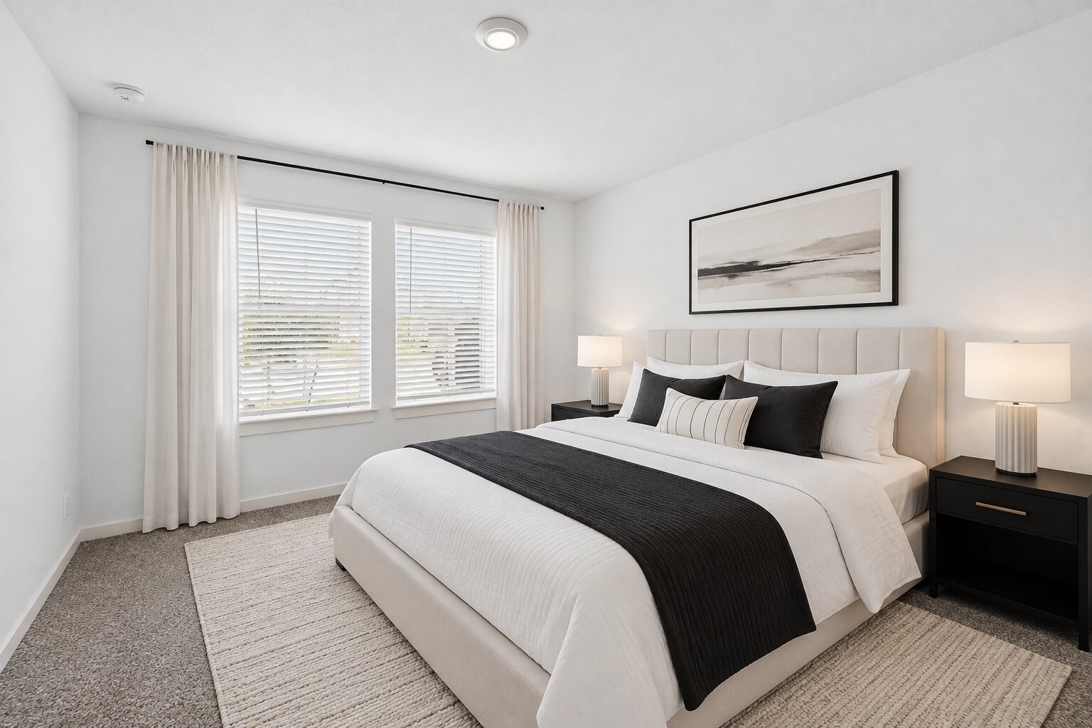 A versatile bedroom ready to suit your needs, whether for rest, work, or hobbies.