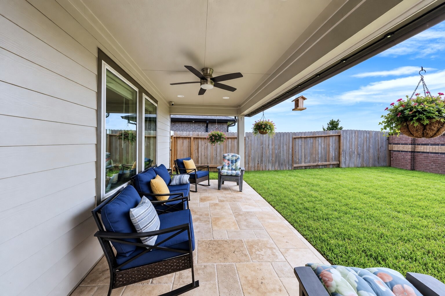 A backyard patio creates a spot to enjoy your morning coffee or unwind outdoors.