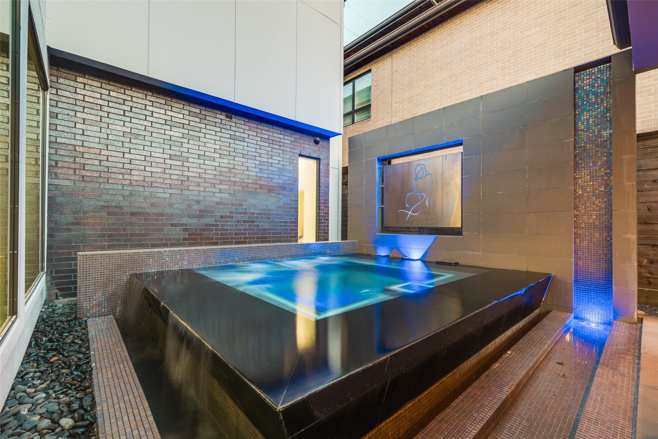 Luxurious custom cocktail heated, salt water pool with LED Multi color lights & waterfall edges - recipient of the 2015 PRISM Award for Best Patio Luxurious custom cocktail heated, salt water pool with LED Multi color lights & waterfall edges - recipient of the 2015 PRISM Award for Best Patio
