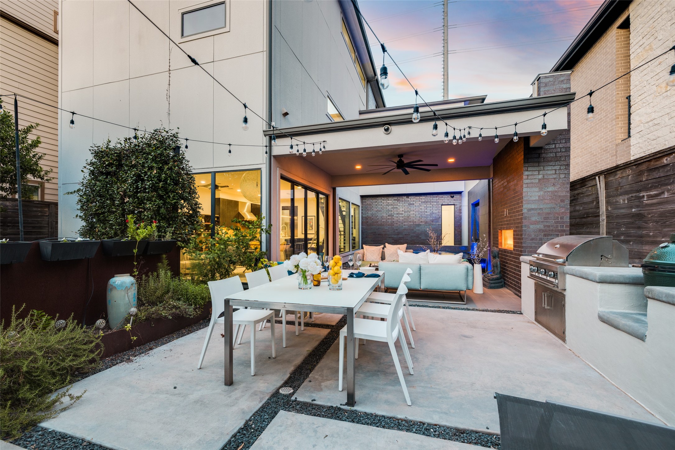 Experience the ultimate outdoor entertainment with floor-to-ceiling sliding glass doors that effortlessly open to the covered outdoor patio & backyard which is encased by an 8 foot cedar fence providing privacy. In ceiling speakers for entertaining.