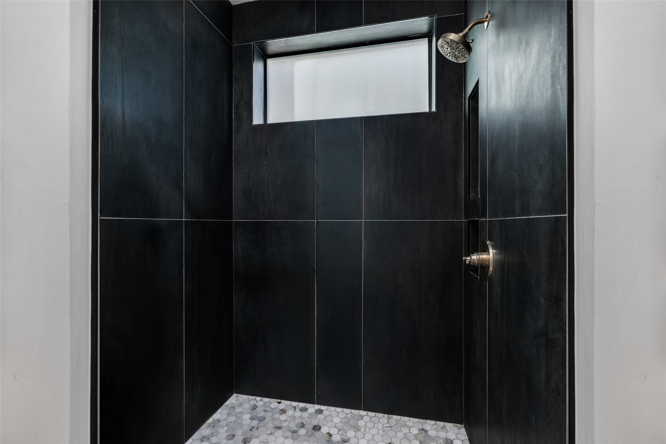 Beautiful black tile shower with window for natural light - new glass doors ordered & will be installed very soon
