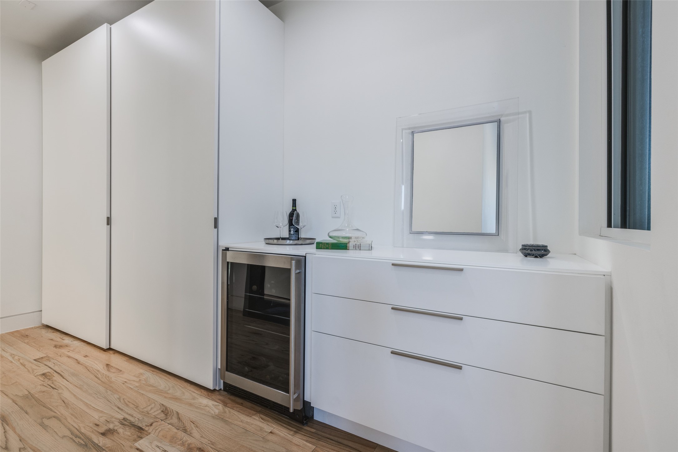 Wonderful Coffee bar with beverage refrigerator, lots of drawer & cabinet space, seller added more high end Pedini Italian closet spaces to the left of the picture
