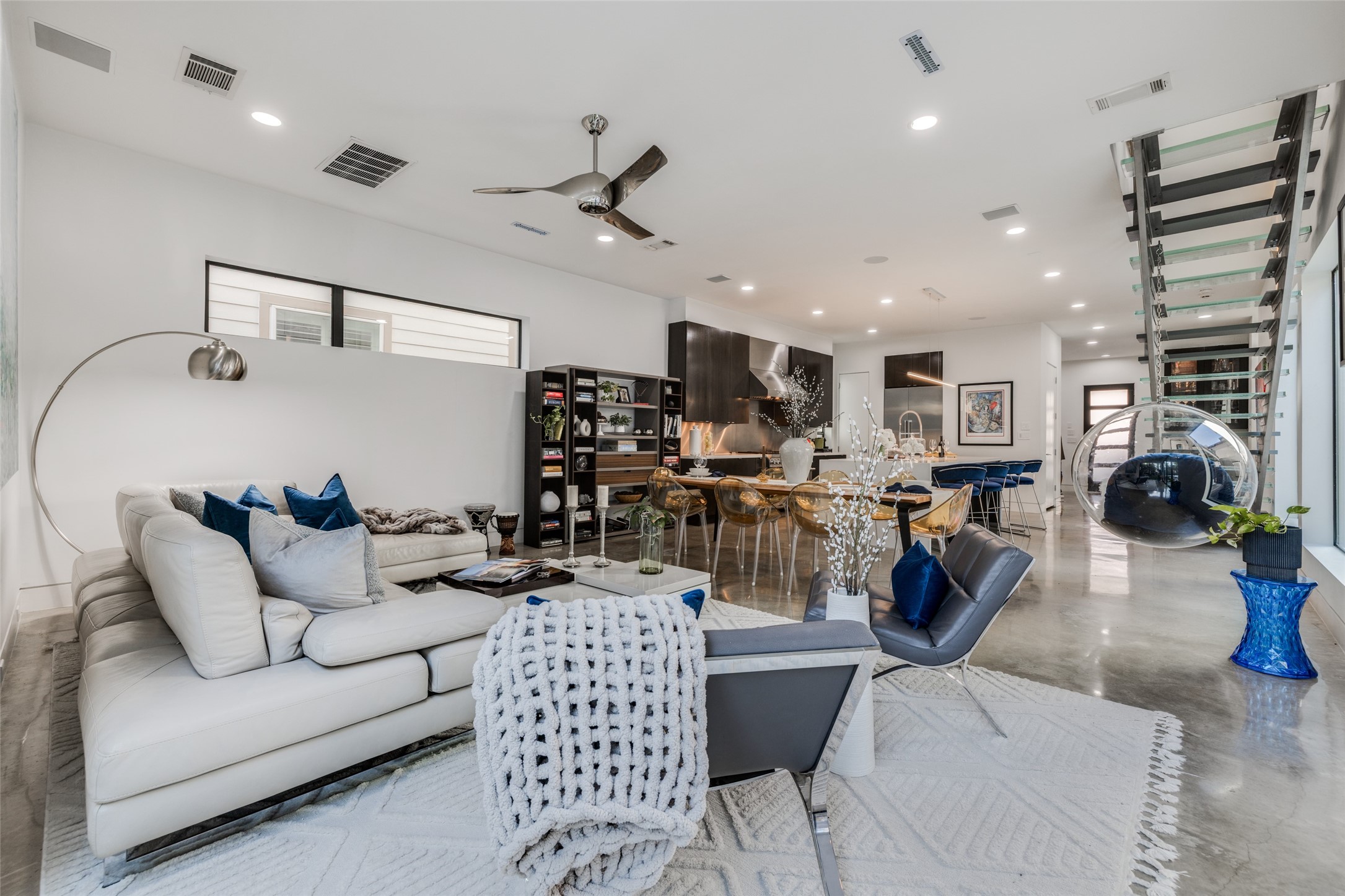 Enjoy Open plan Living - large open spaces looking out through walls of windows & doors to a beautiful back yard