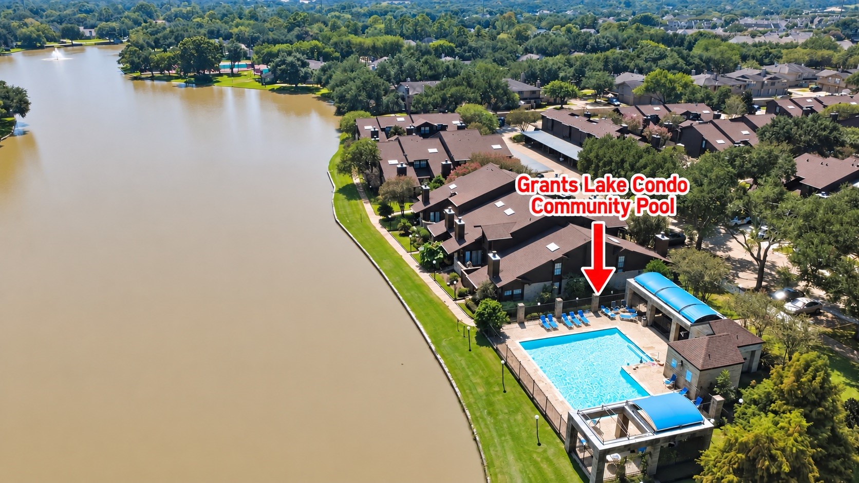 Community pool overlooking lake