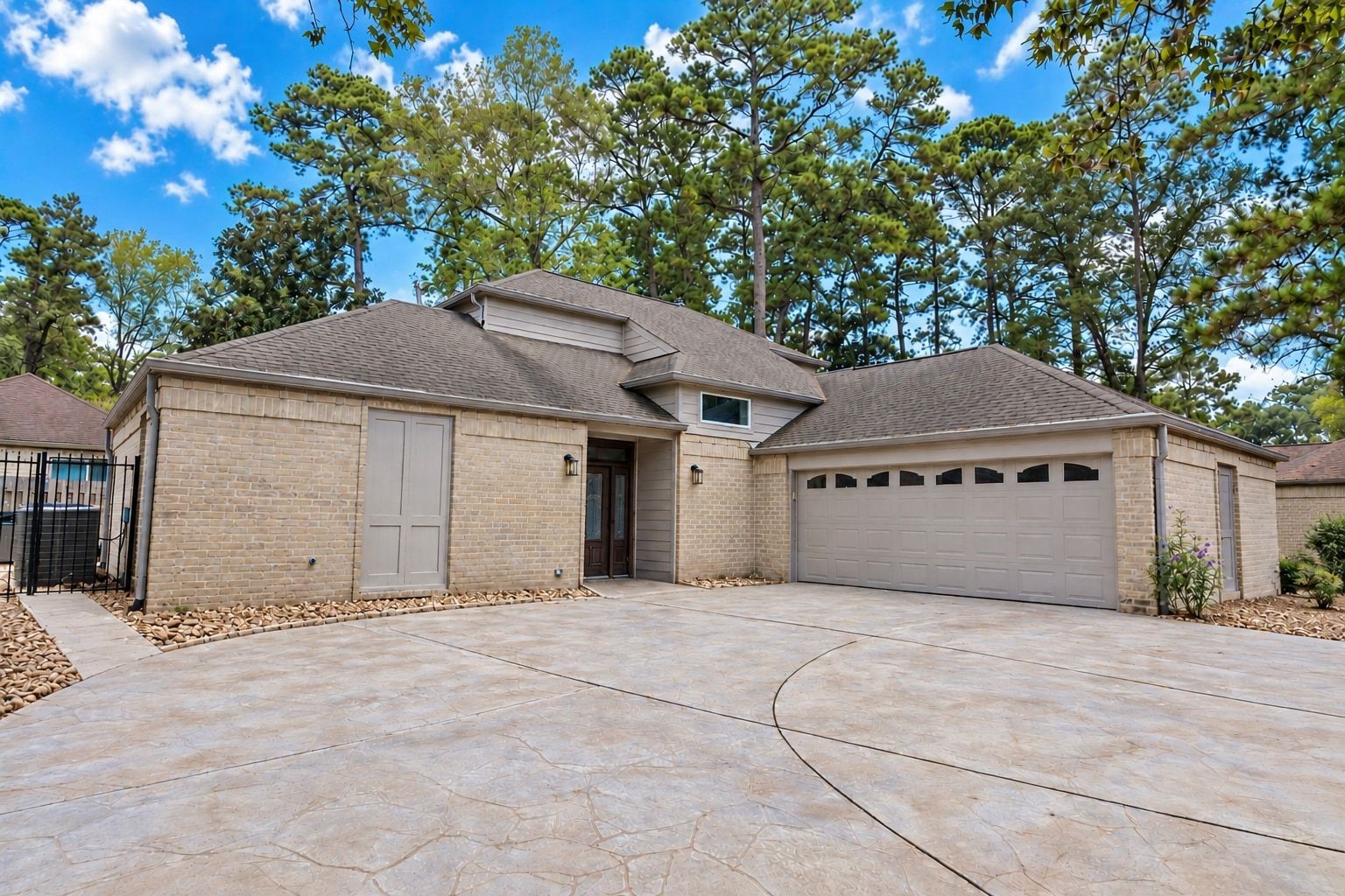 Welcome to 3207 Laurel Point Ct. with stamped concrete