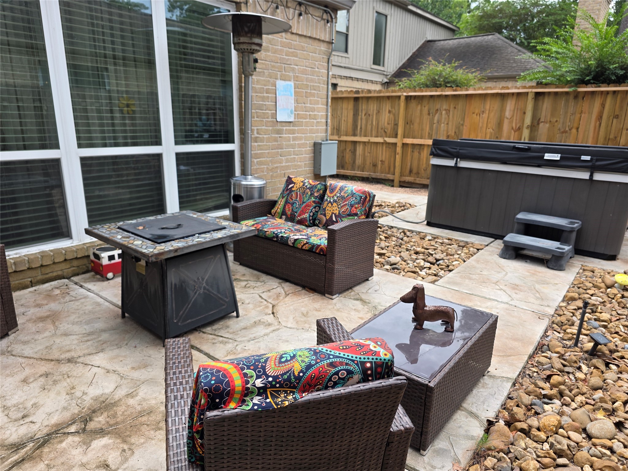 Very cute patio with hot tub for unwinding and relaxing