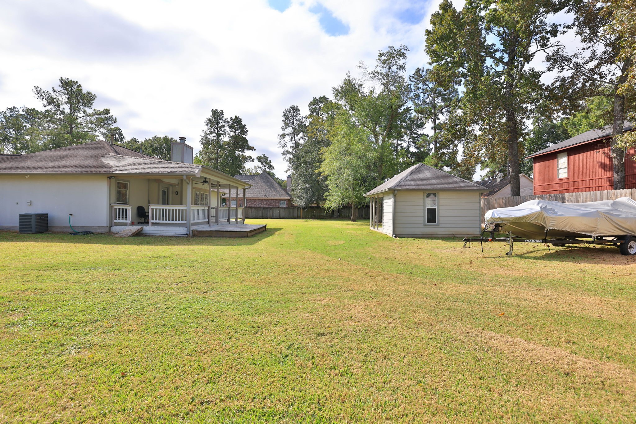 Backyard is fenced with plenty of space for a boat and/or RV