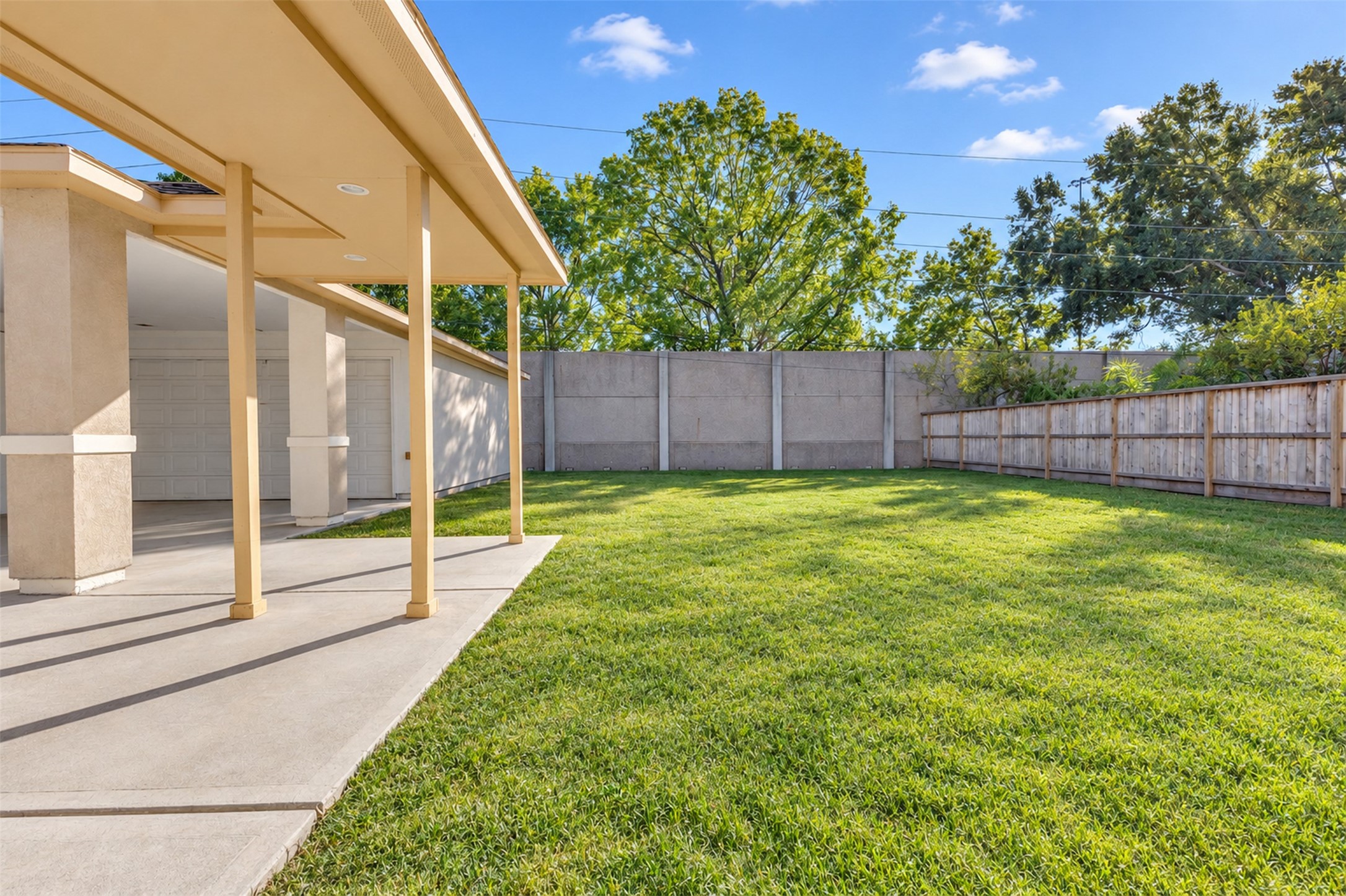 Backyard: A generously sized backyard offers space for outdoor seating, gardening, and entertaining.